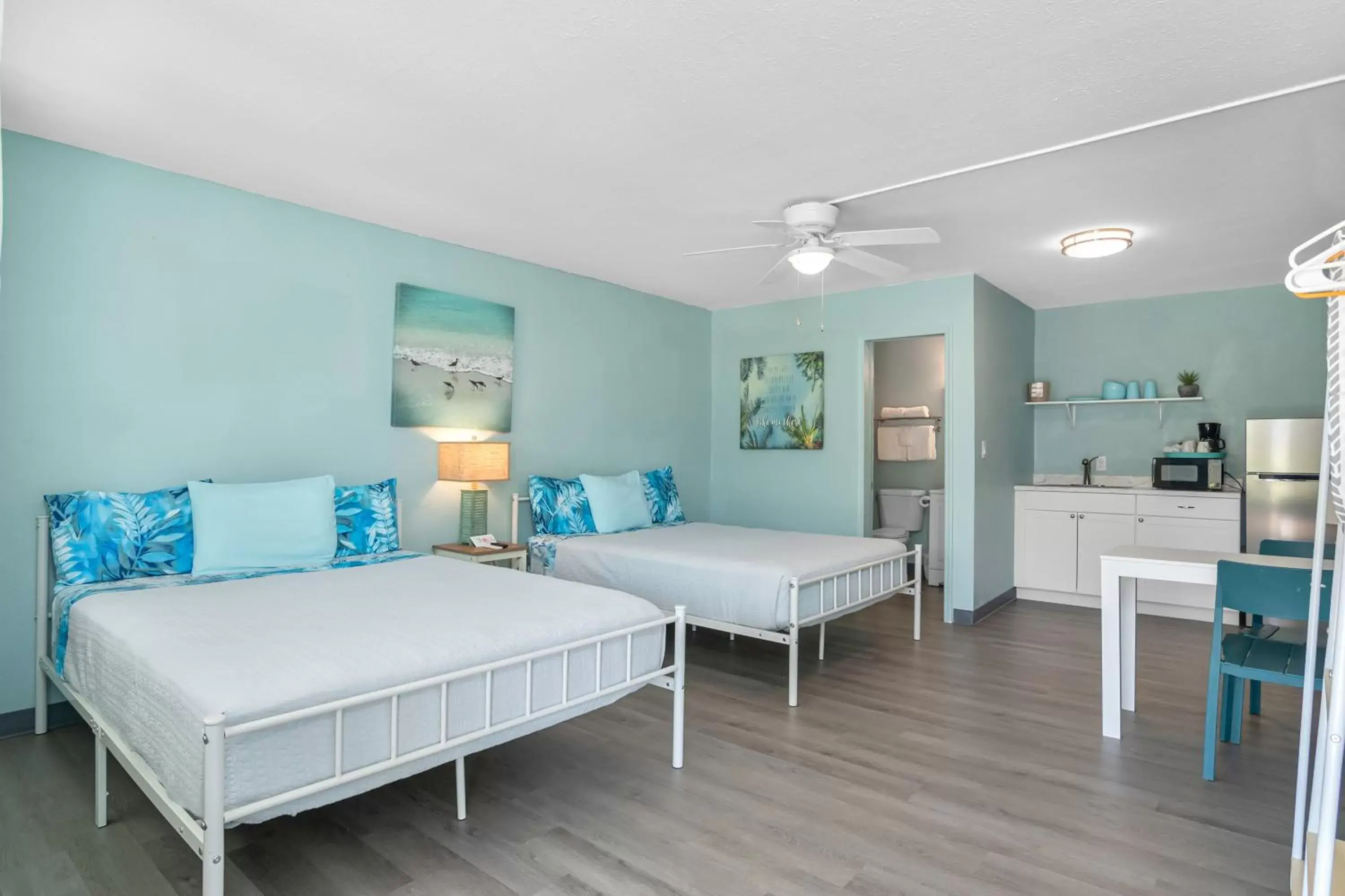 Photo of the whole room, Bed in Latitude 26 Waterfront Boutique Resort - Fort Myers Beach