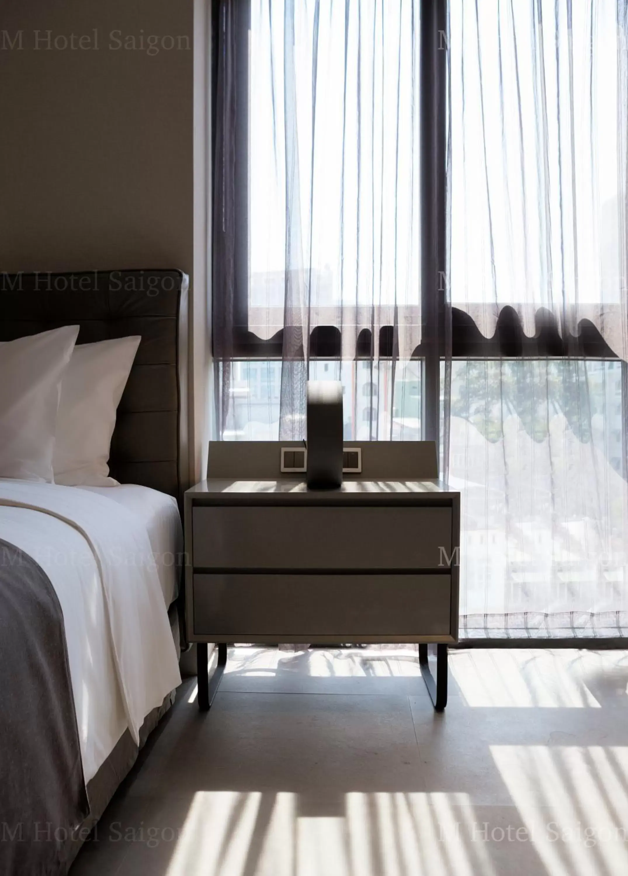 View (from property/room), Bed in M Hotel Saigon View (from property/room), Bed in M Hotel Saigon