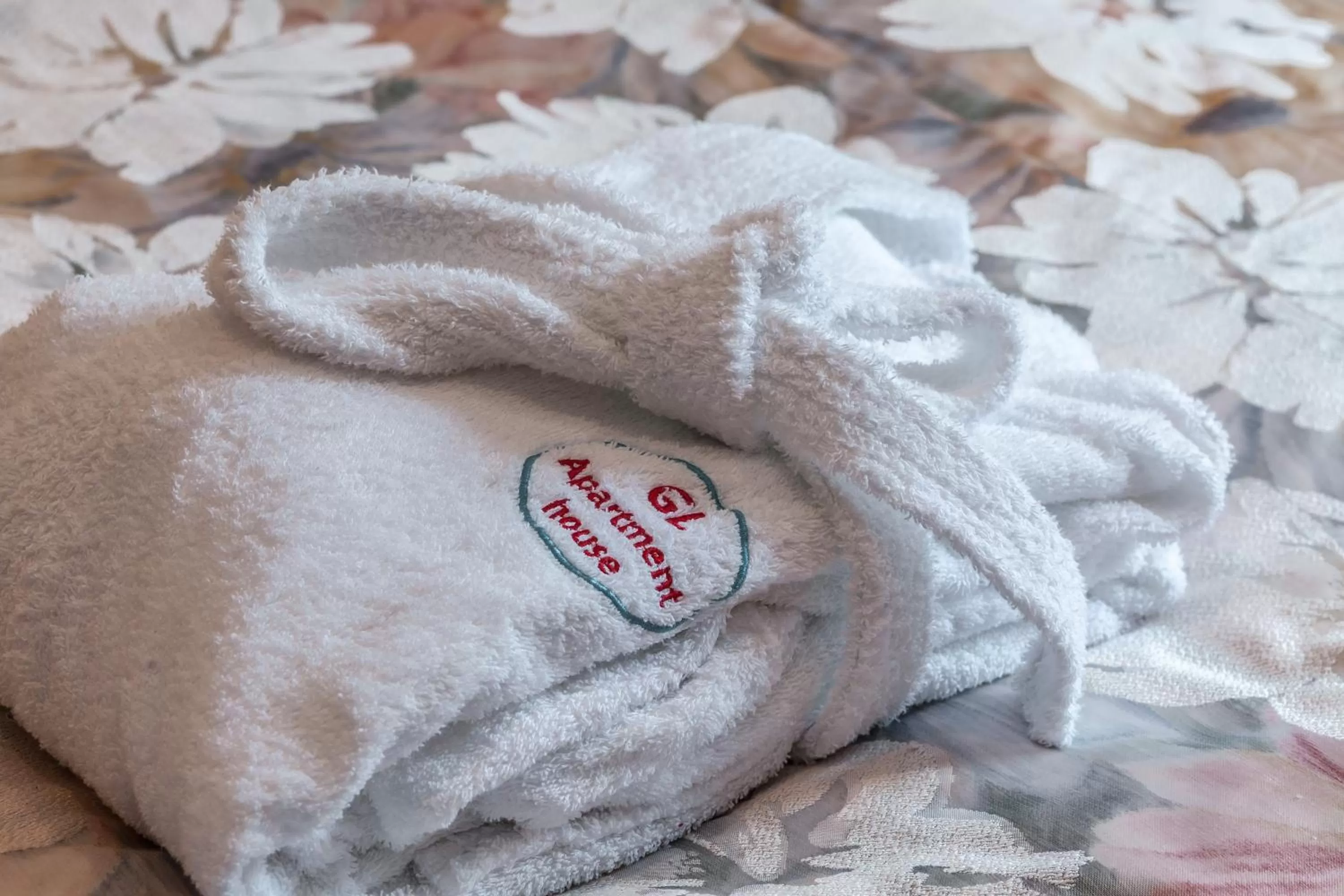 Property logo or sign, Bed in GL Suites