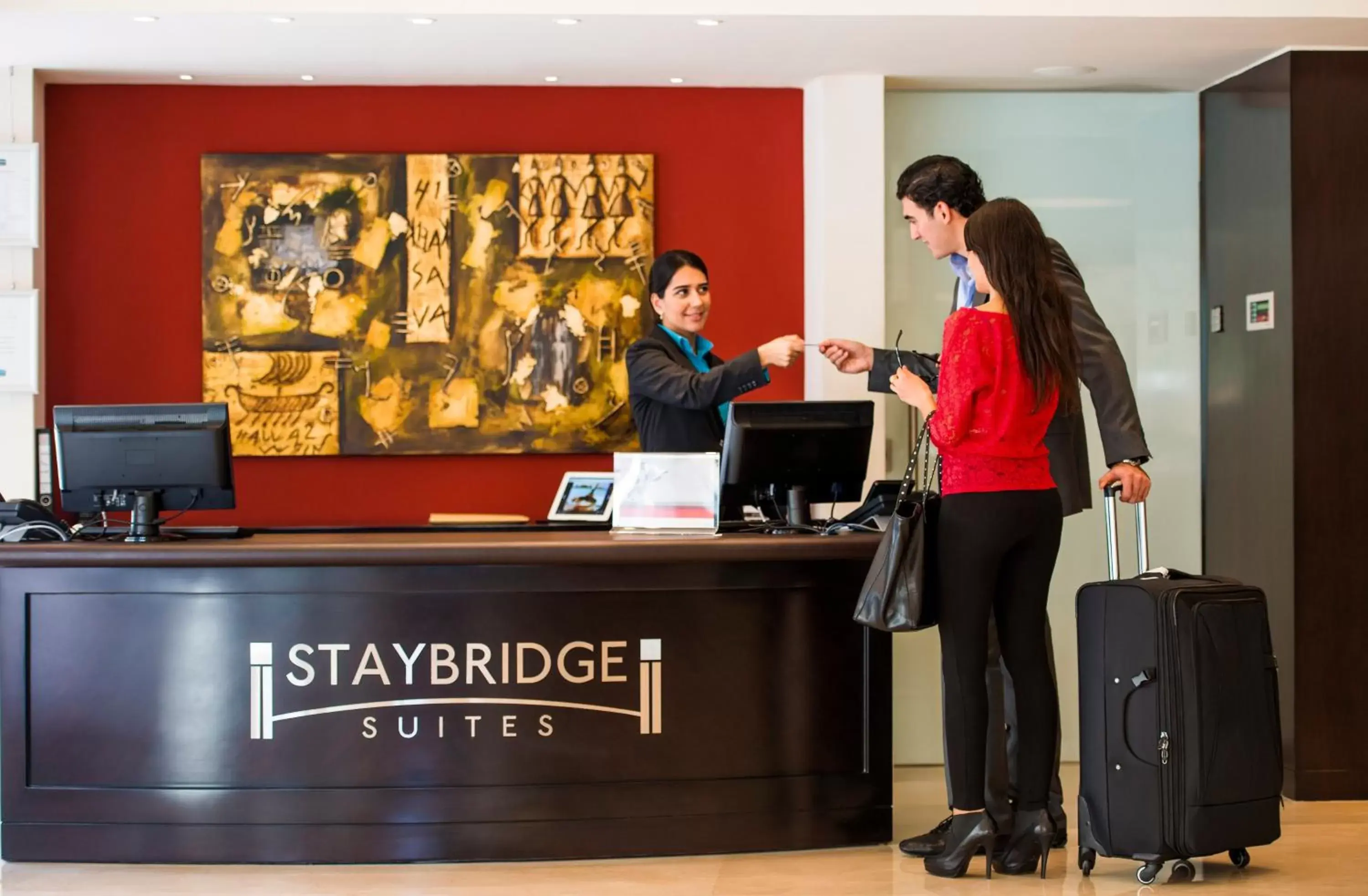 Property building, Lobby/Reception in Staybridge Suites Hotel, an IHG Hotel