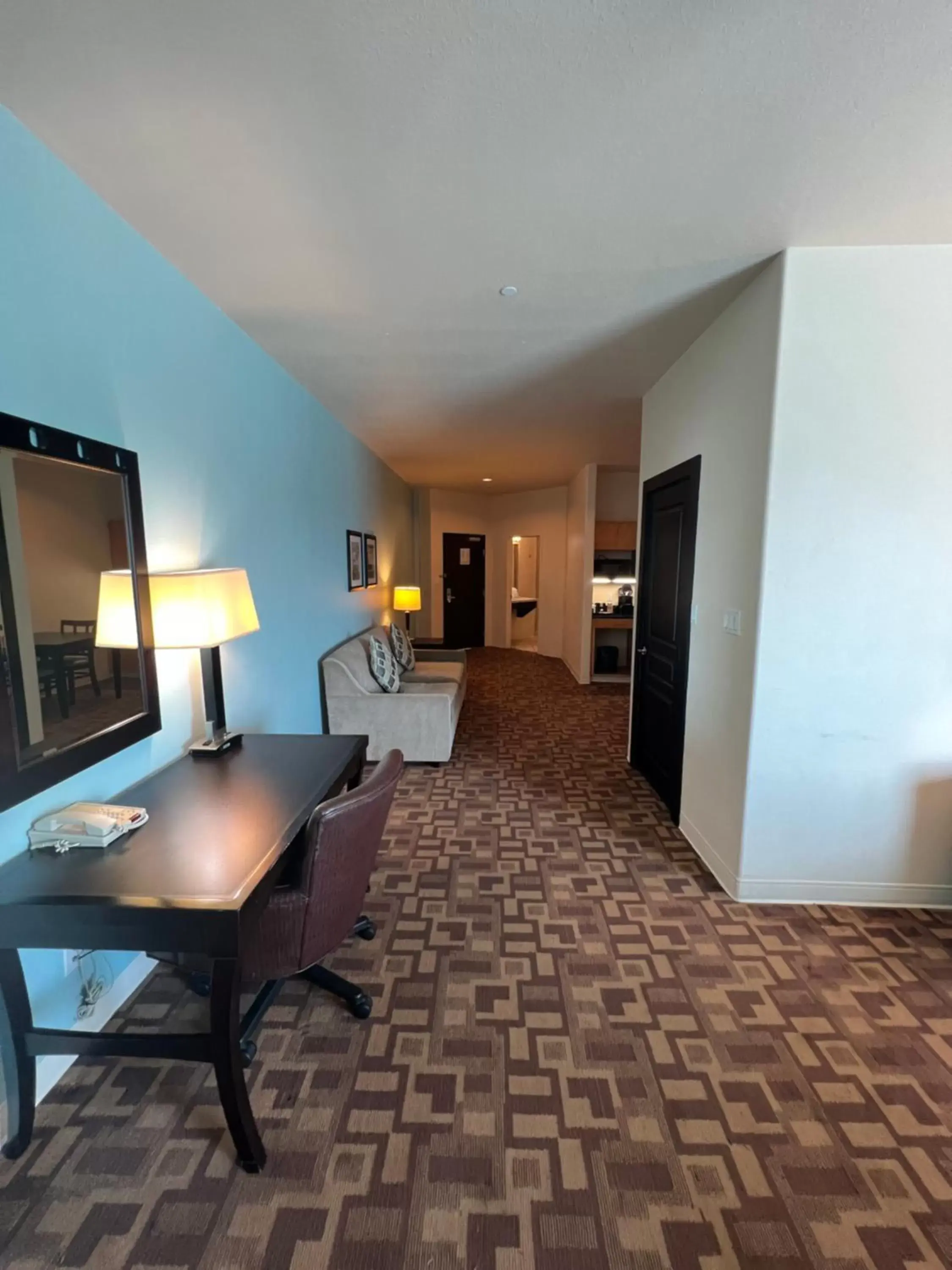Photo of the whole room, TV/Entertainment Center in Sunchase Inn & Suites