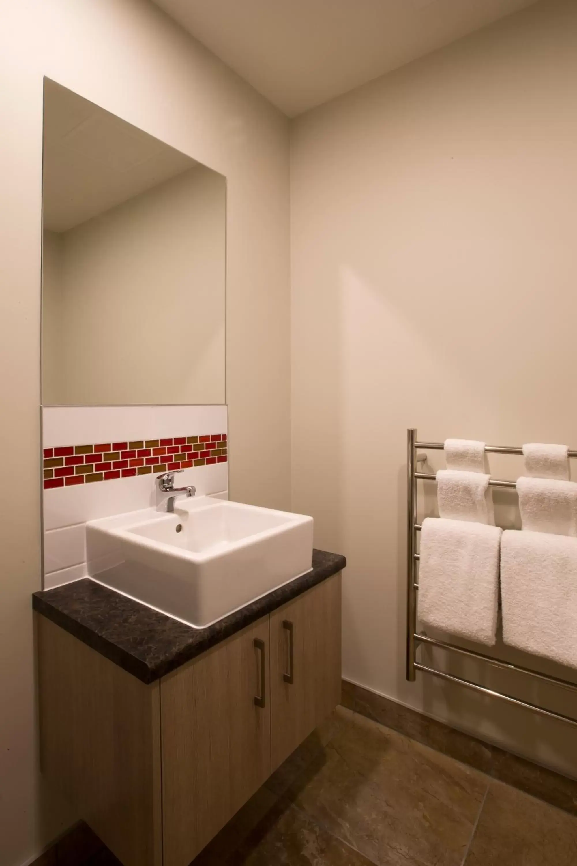 Bathroom in Ramada Suites by Wyndham Christchurch City