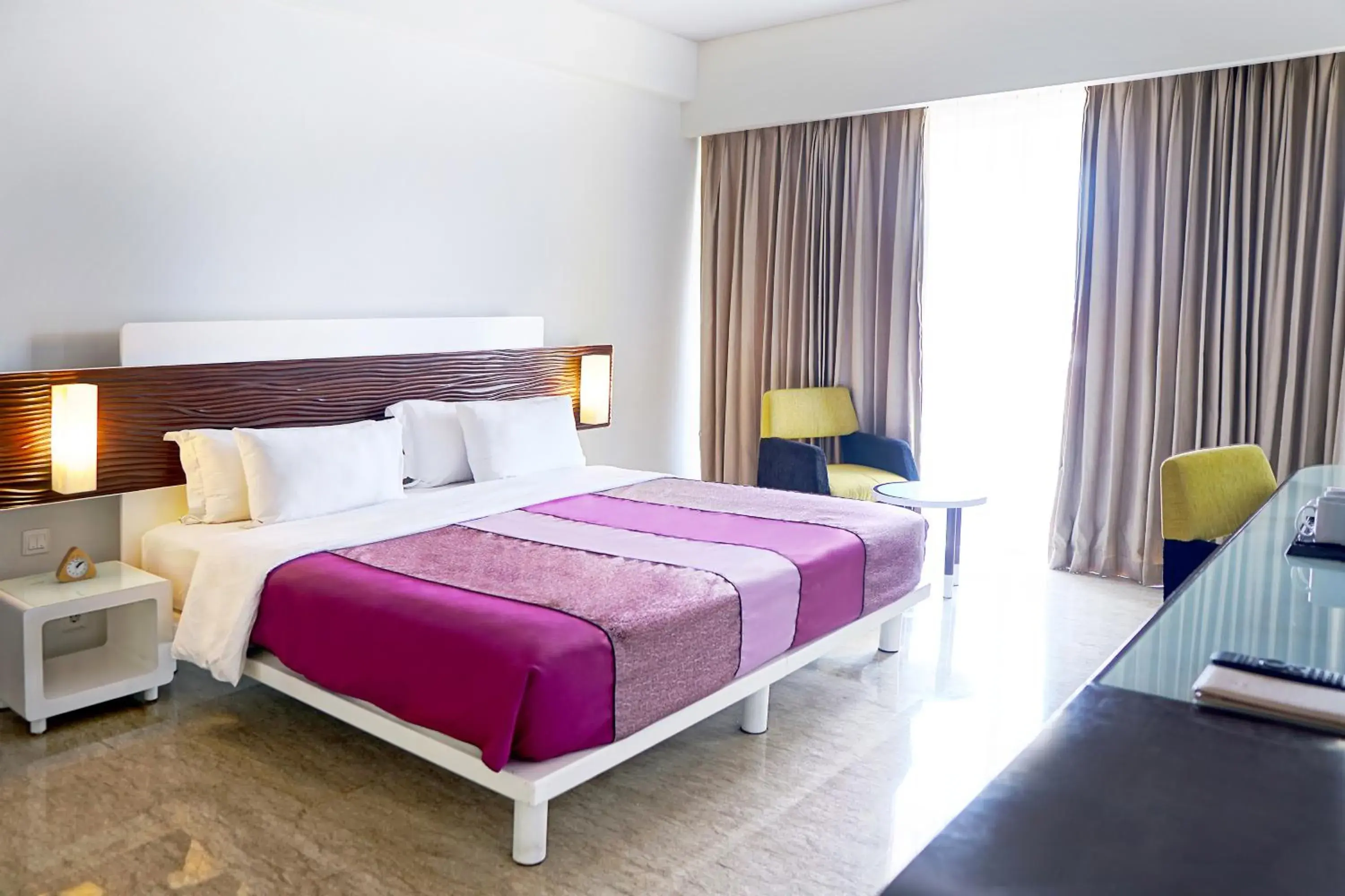 Photo of the whole room, Bed in Sensa Hotel Bandung