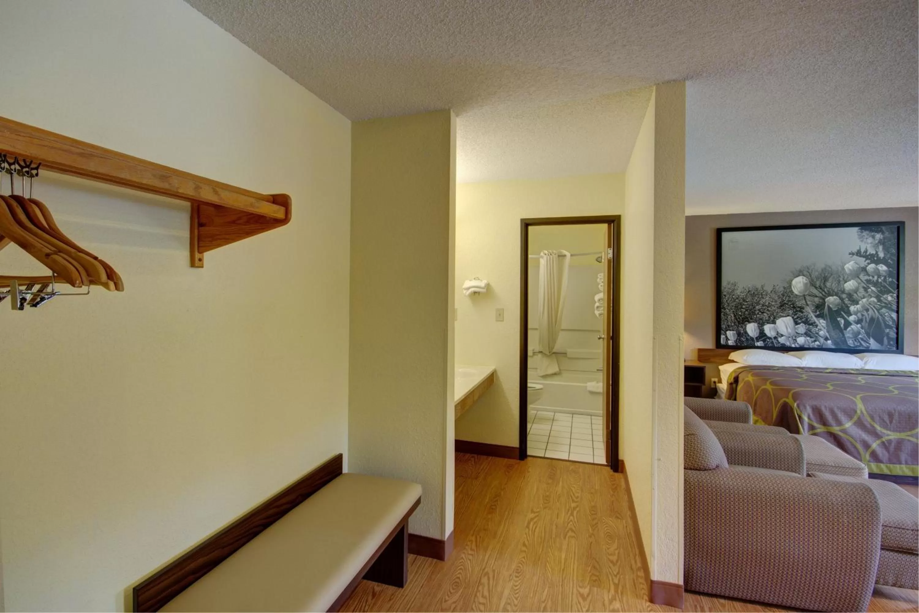 Decorative detail, Bed in Super 8 by Wyndham Zanesville