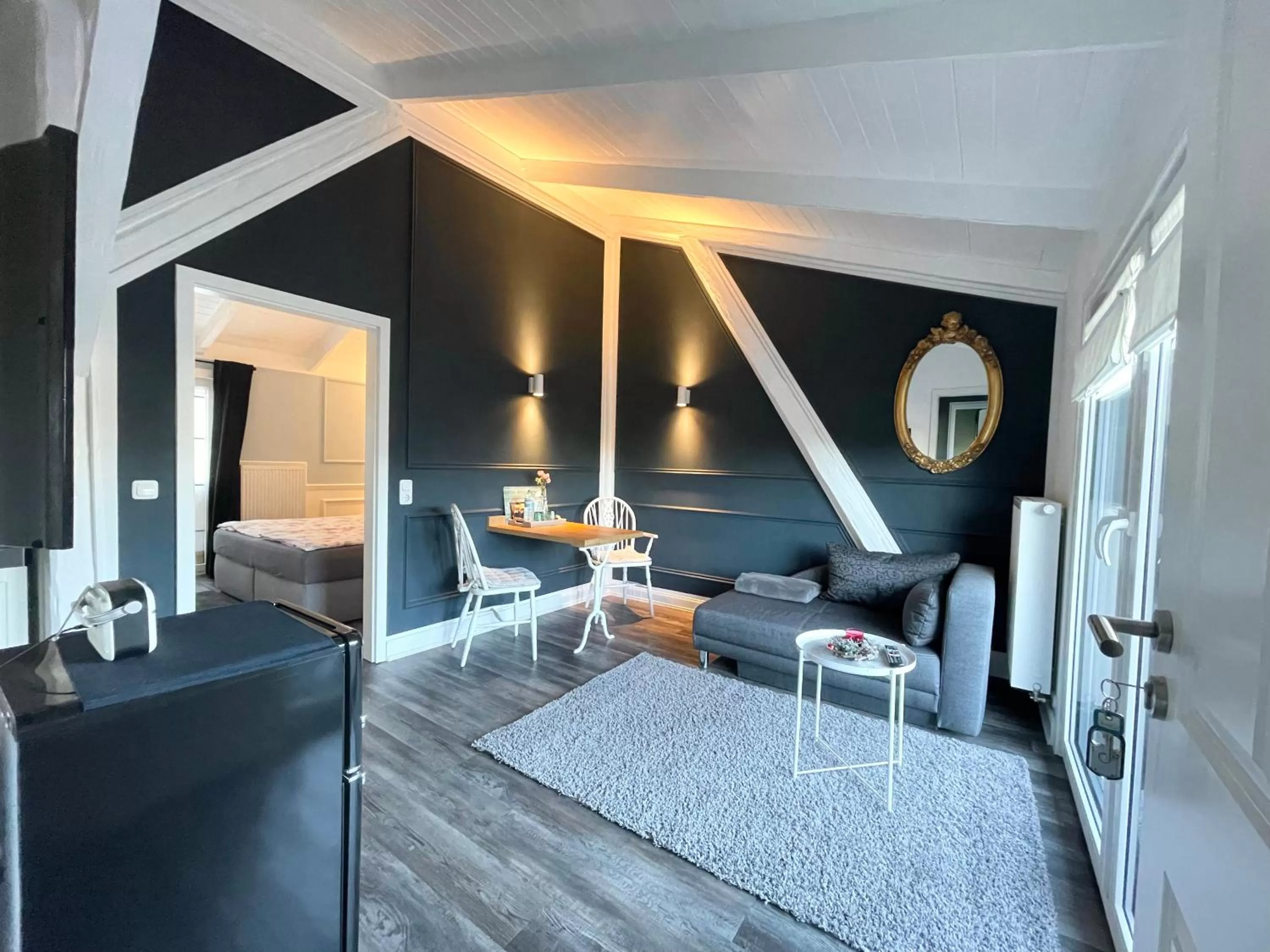 Living room, Bed in Rosenhof-Lodge