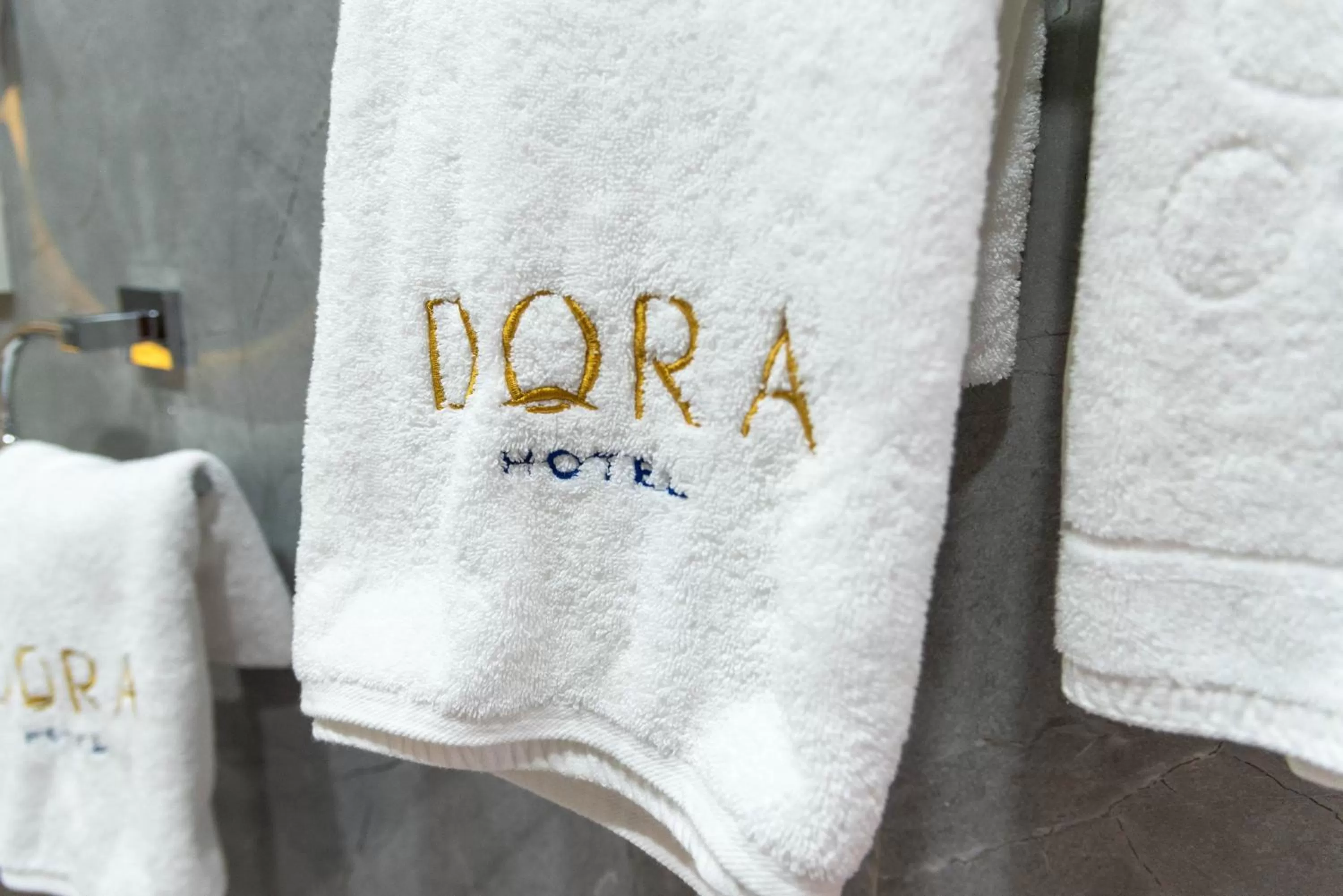 Property Logo/Sign in Dora Hotel
