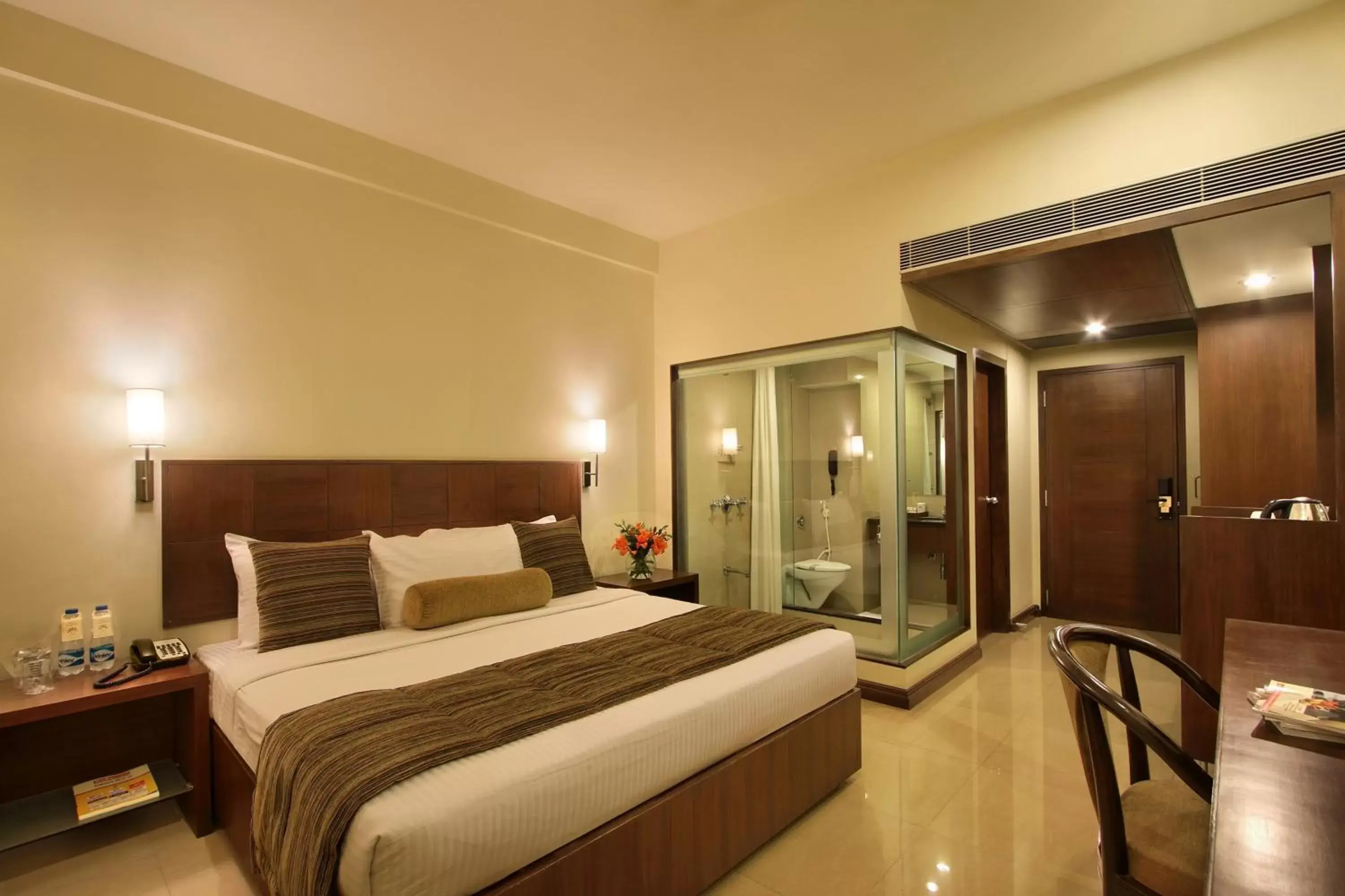 Seating area, Bed in Hotel Express Residency Vadodara Seating area, Bed in Hotel Express Residency Vadodara