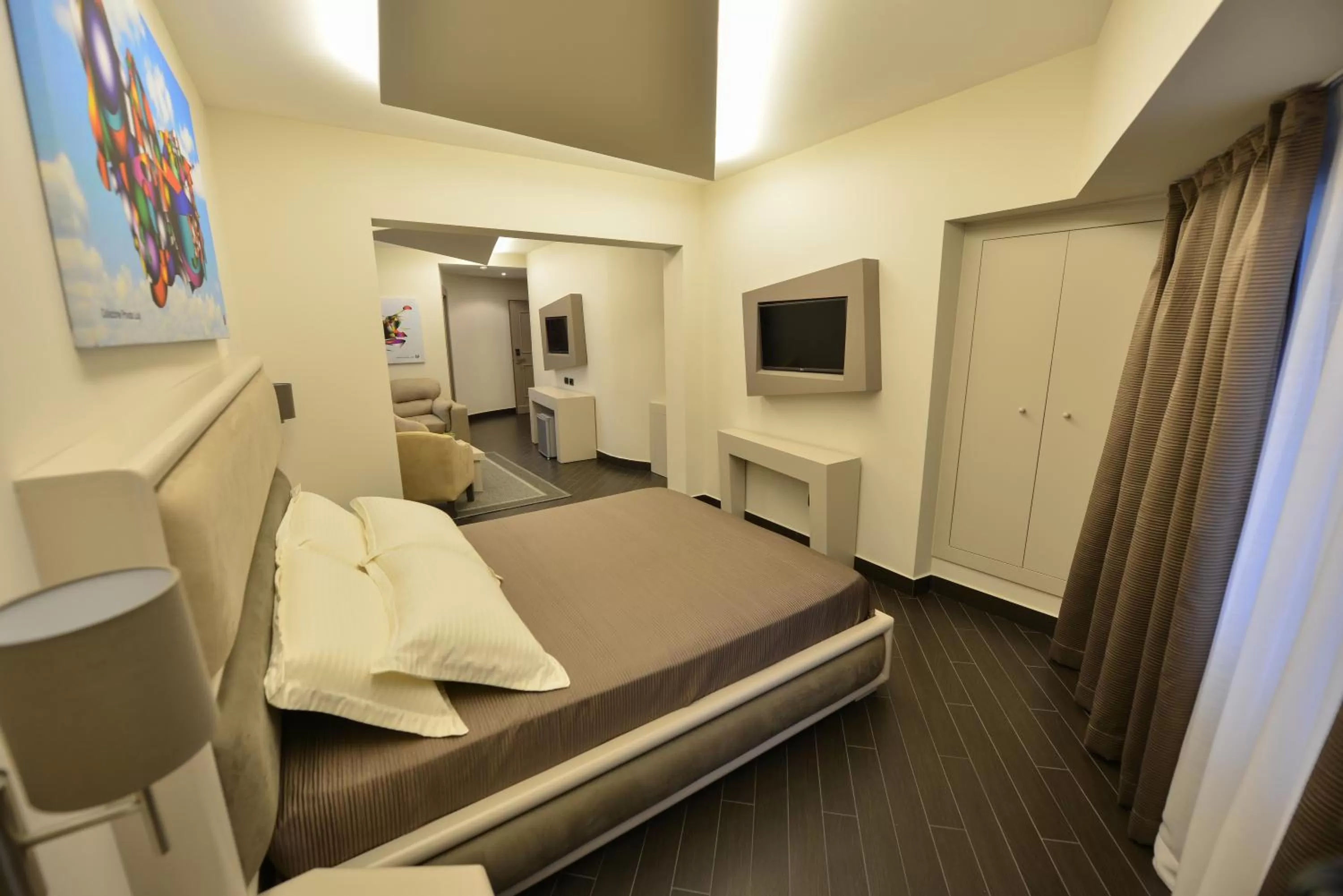 Bed in Petit Hotel Elita