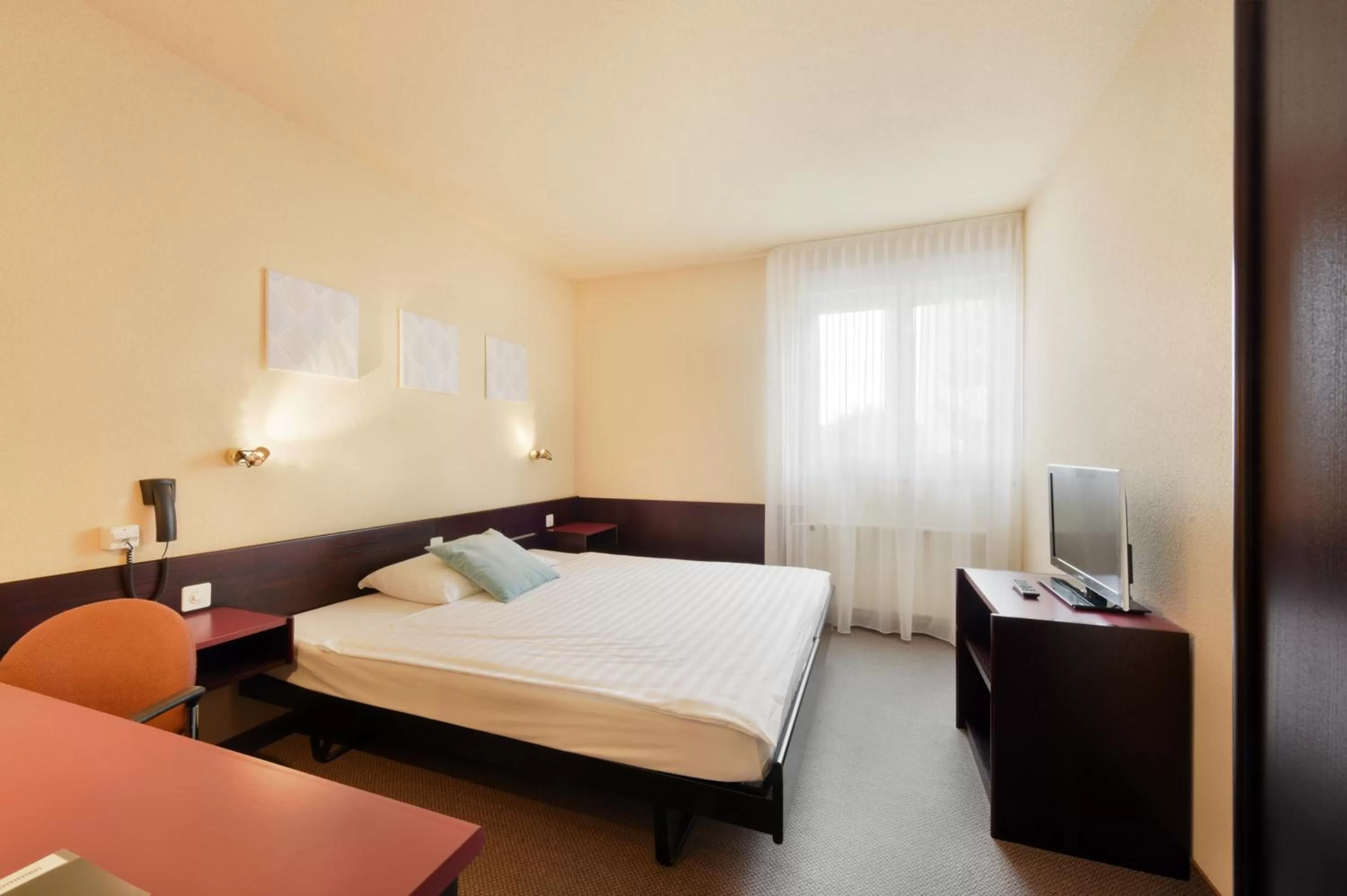 Bed in Hôtel des Mosaiques