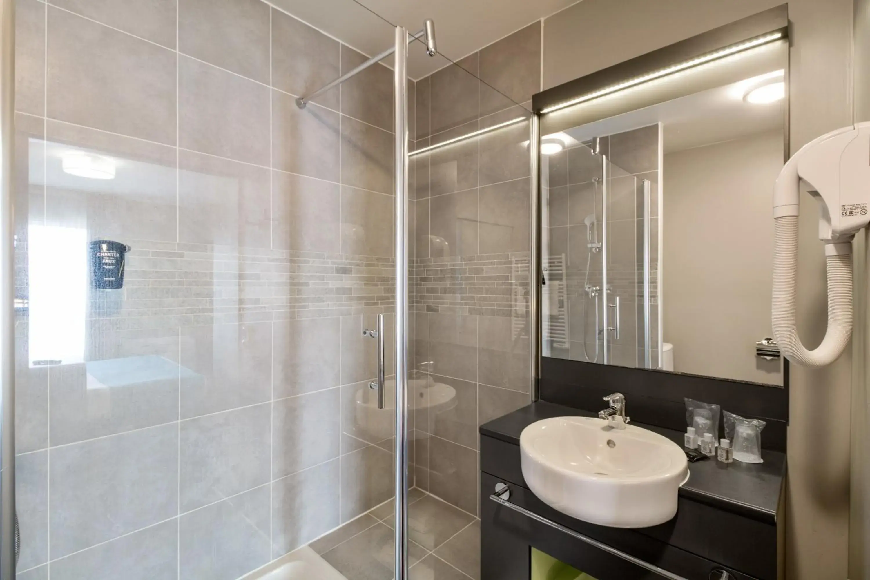 Bathroom in Appart'City Confort Le Bourget - Aeroport