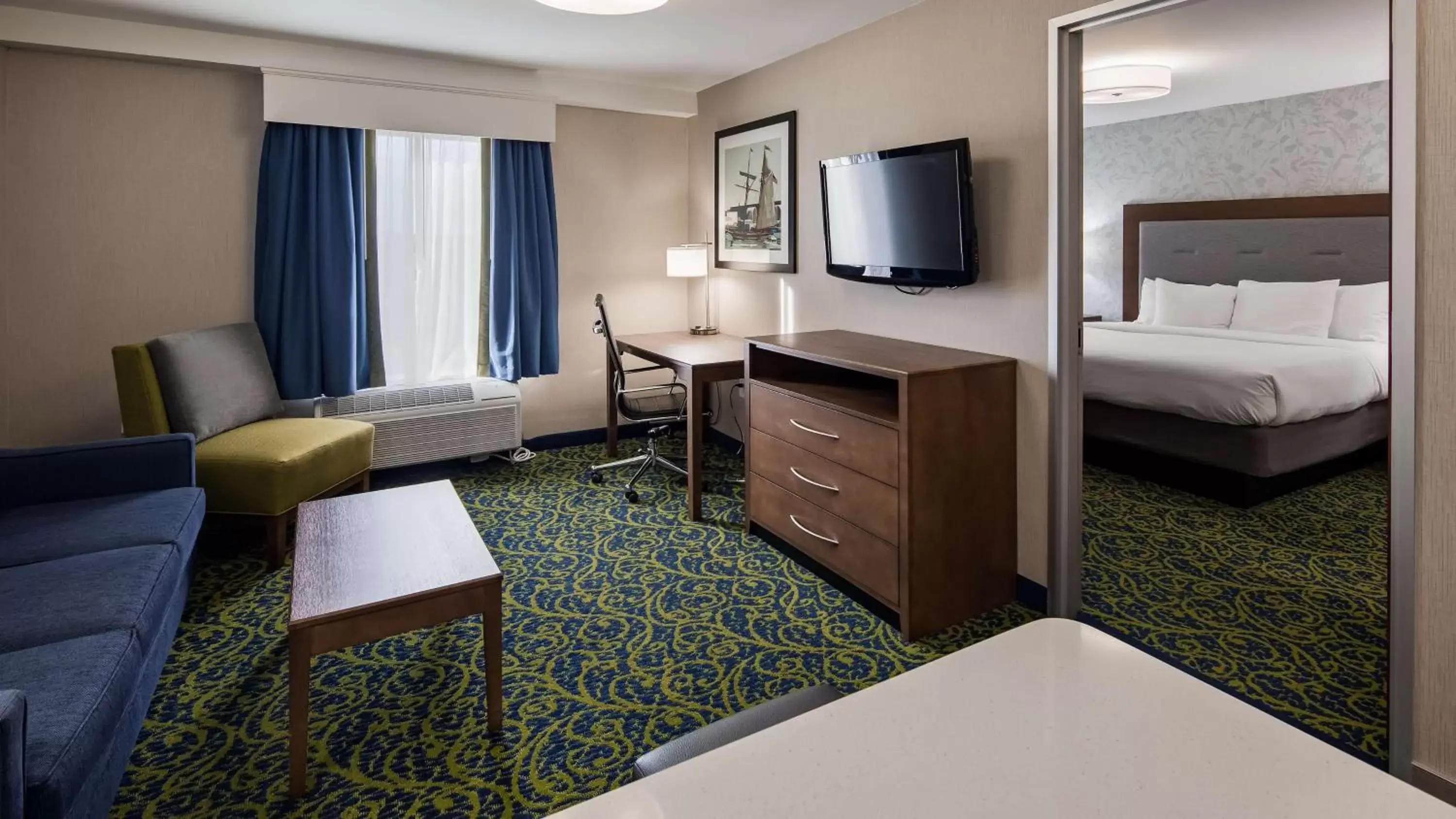 Photo of the whole room, TV/Entertainment Center in Best Western Plus Portsmouth Hotel & Suites