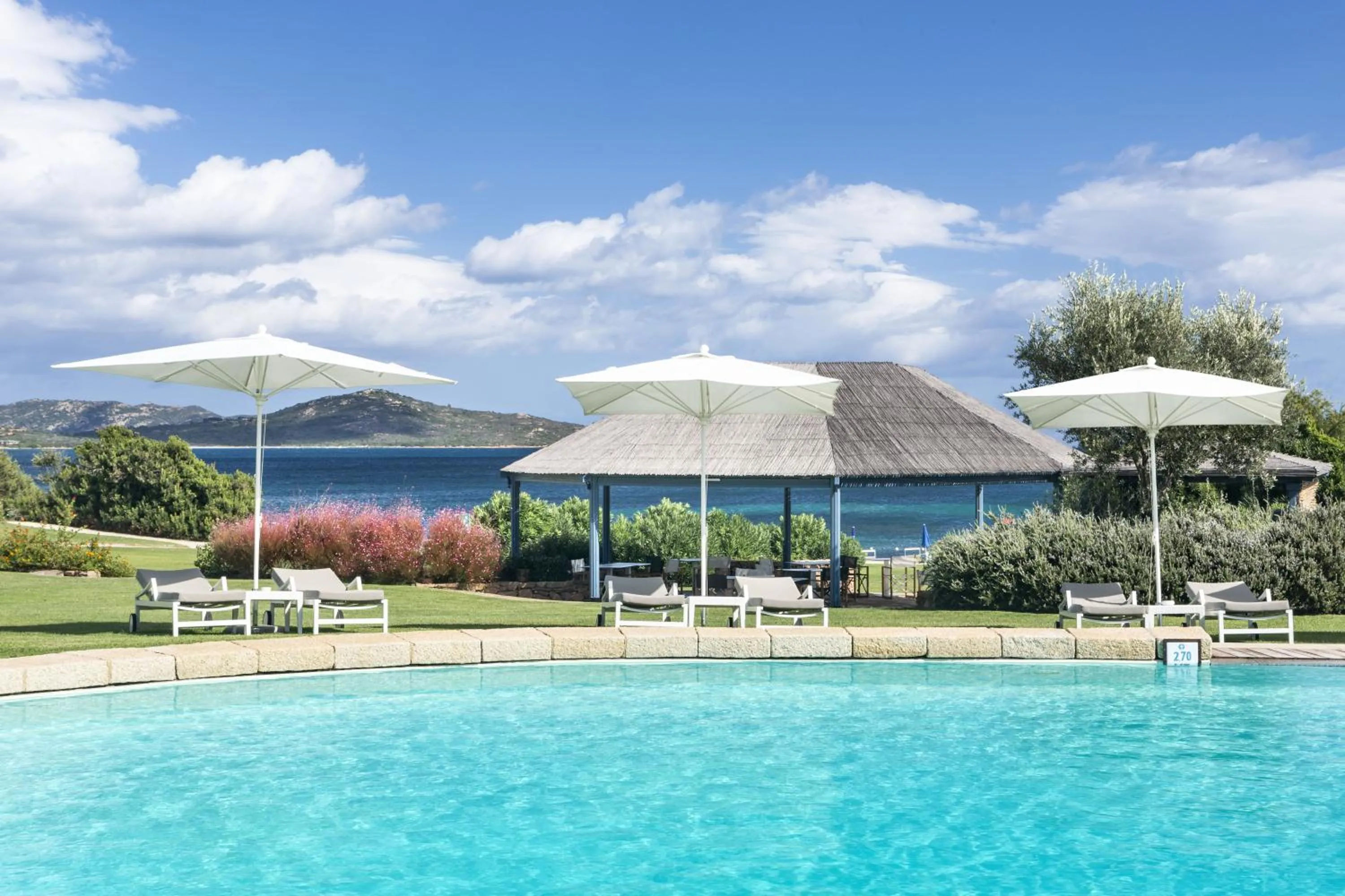 Swimming pool in Due Lune Puntaldia Resort & Golf