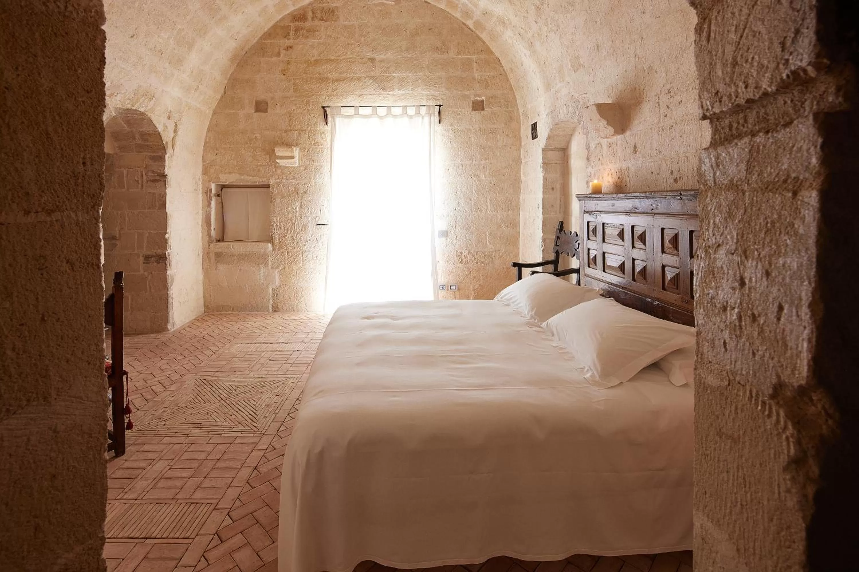 Photo of the whole room, Bed in Sextantio Le Grotte Della Civita