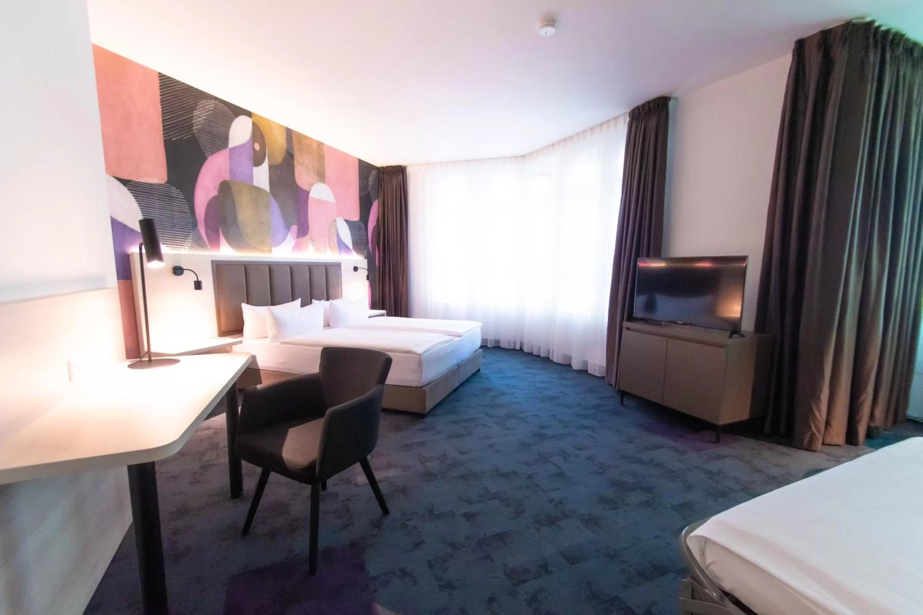 Photo of the whole room, Bed in Taste Hotel Kulmbach