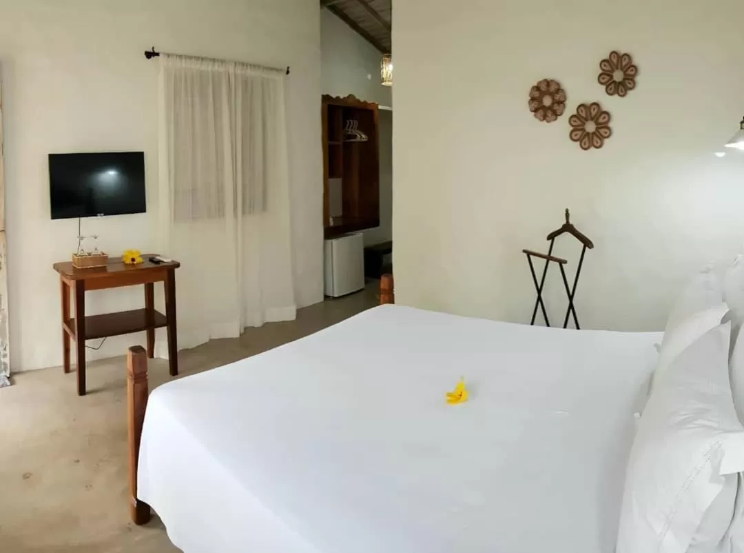 Photo of the whole room, Bed in Pousada Villages Boutique Hotel - 150m da Praia da Laje