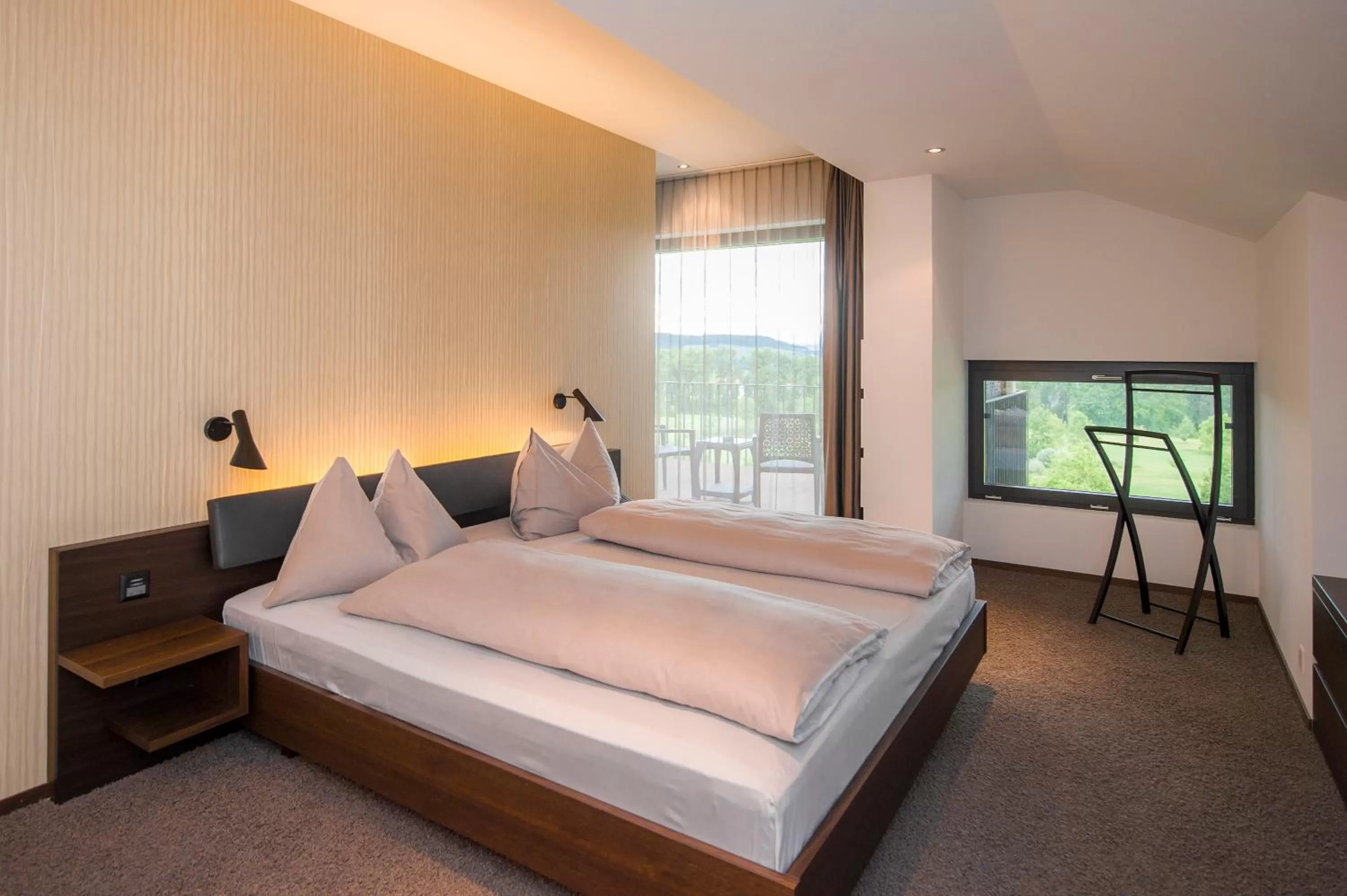 Photo of the whole room, Bed in Wellnesshotel Golfpanorama