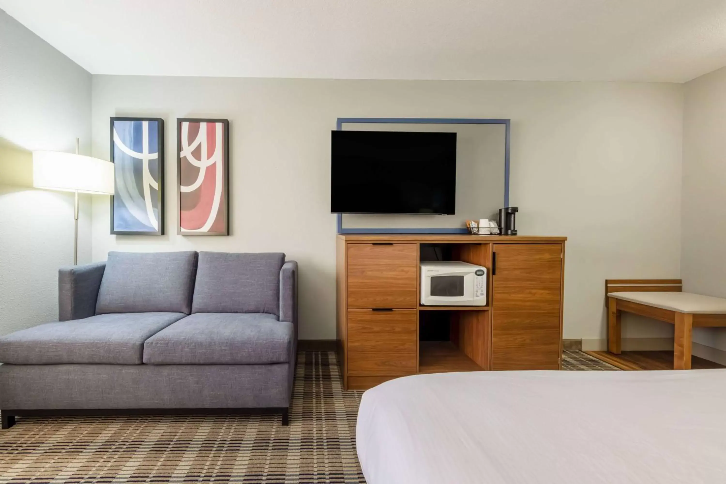 Photo of the whole room, TV/Entertainment Center in AmericInn by Wyndham Duluth