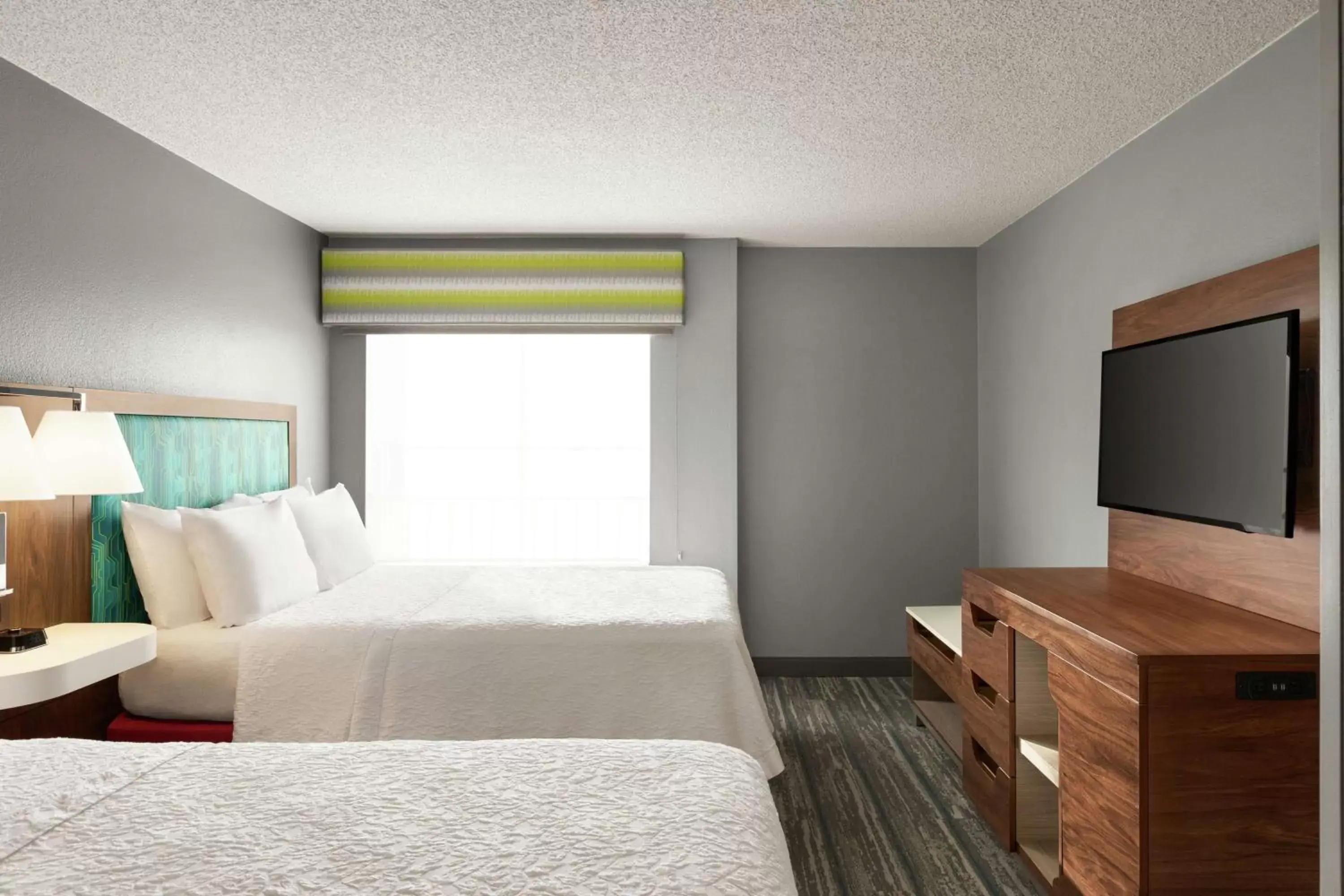 Bed in Hampton Inn & Suites Fort Lauderdale Airport