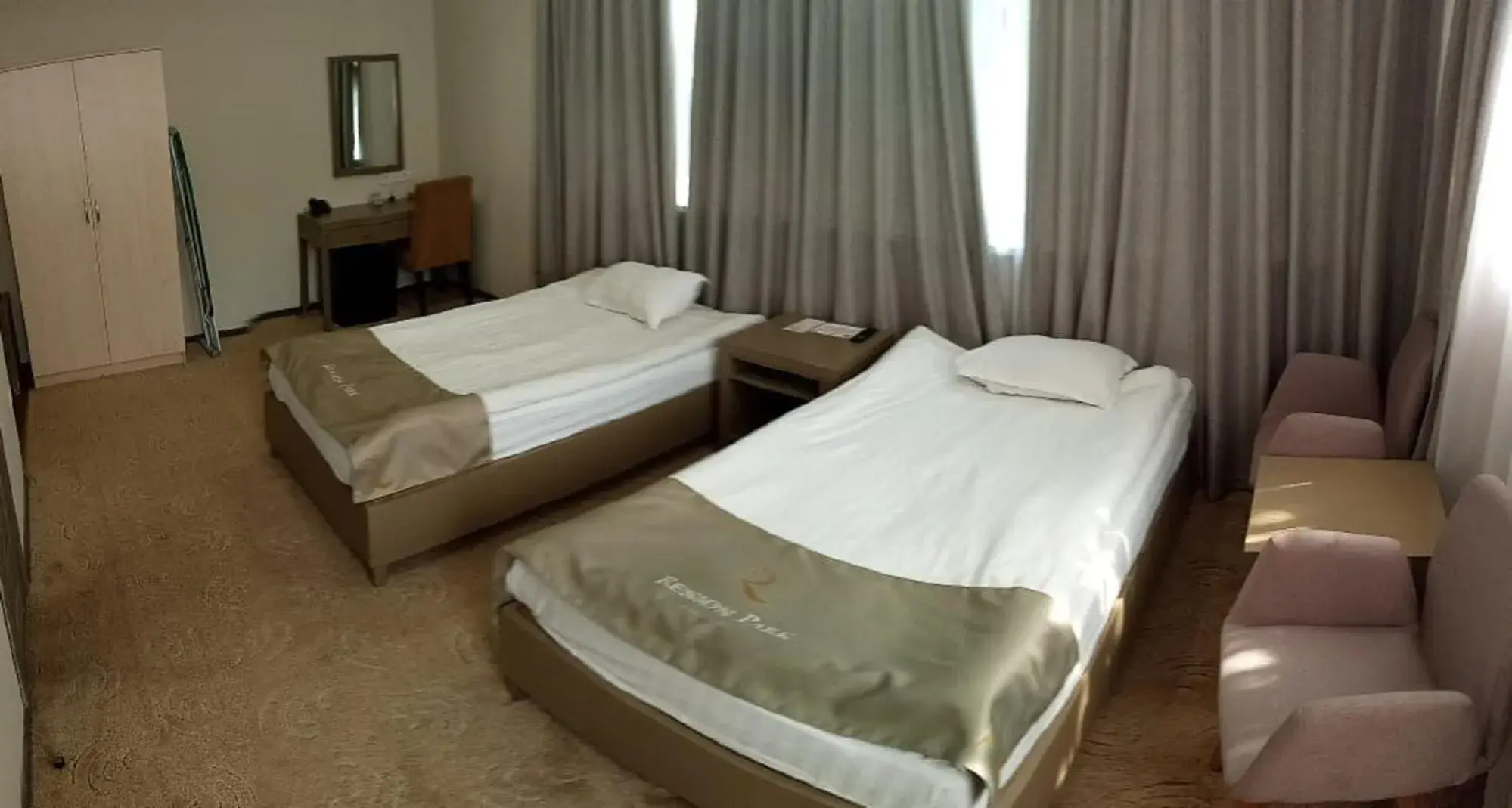 Photo of the whole room, Bed in Renion Hotel