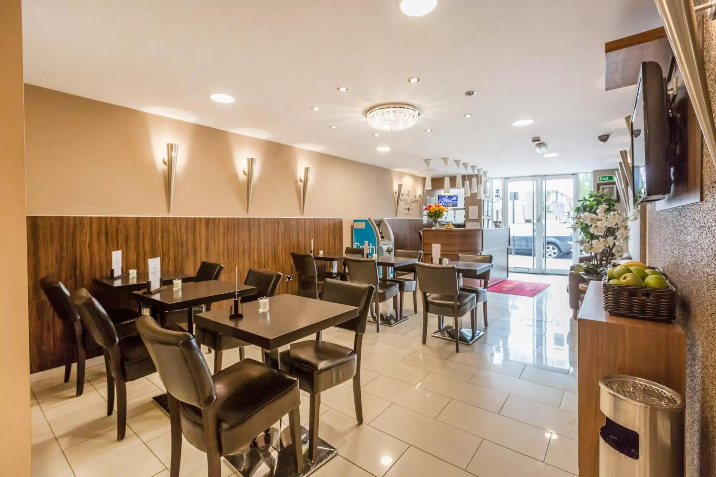 Communal lounge/ TV room, Restaurant/Places to Eat in Prince Regent Hotel Excel London