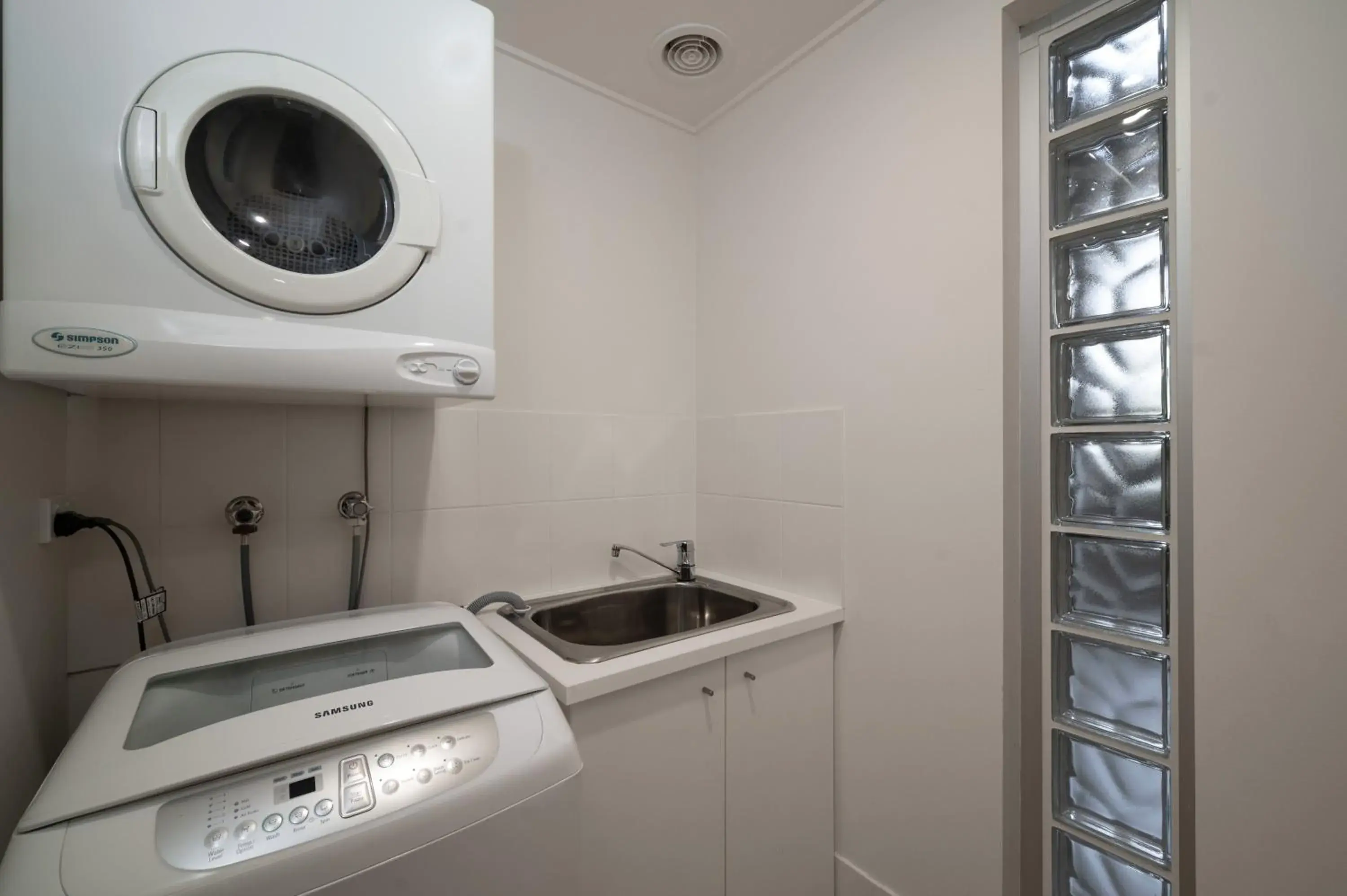 washing machine, Kitchen/Kitchenette in The Sebel Twin Waters