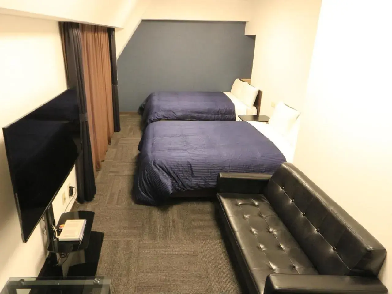 Bed in HOTEL LiVEMAX BUDGET Shinbashi