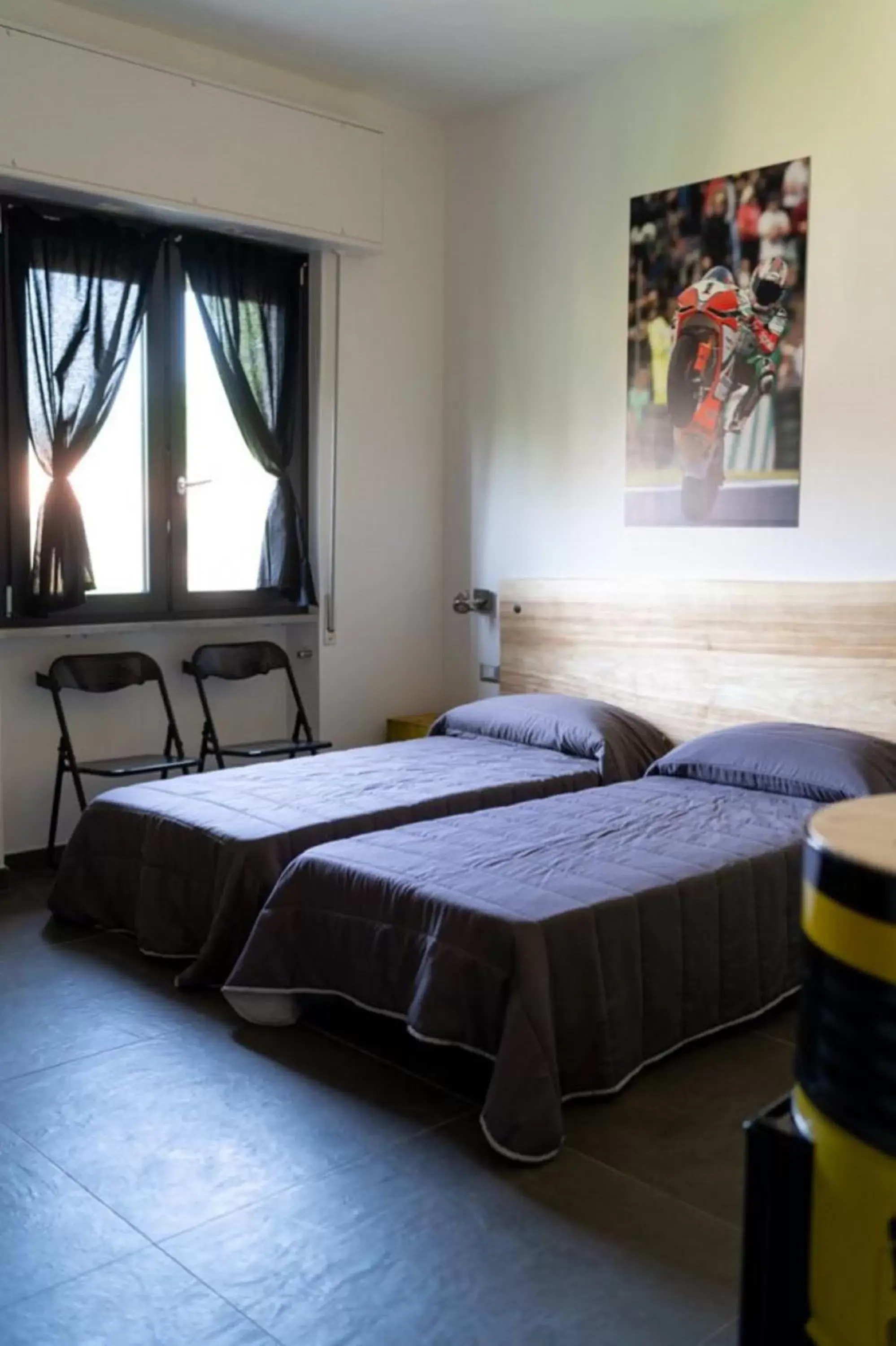 Photo of the whole room, Bed in Italian Piston House Sport Moto Rent