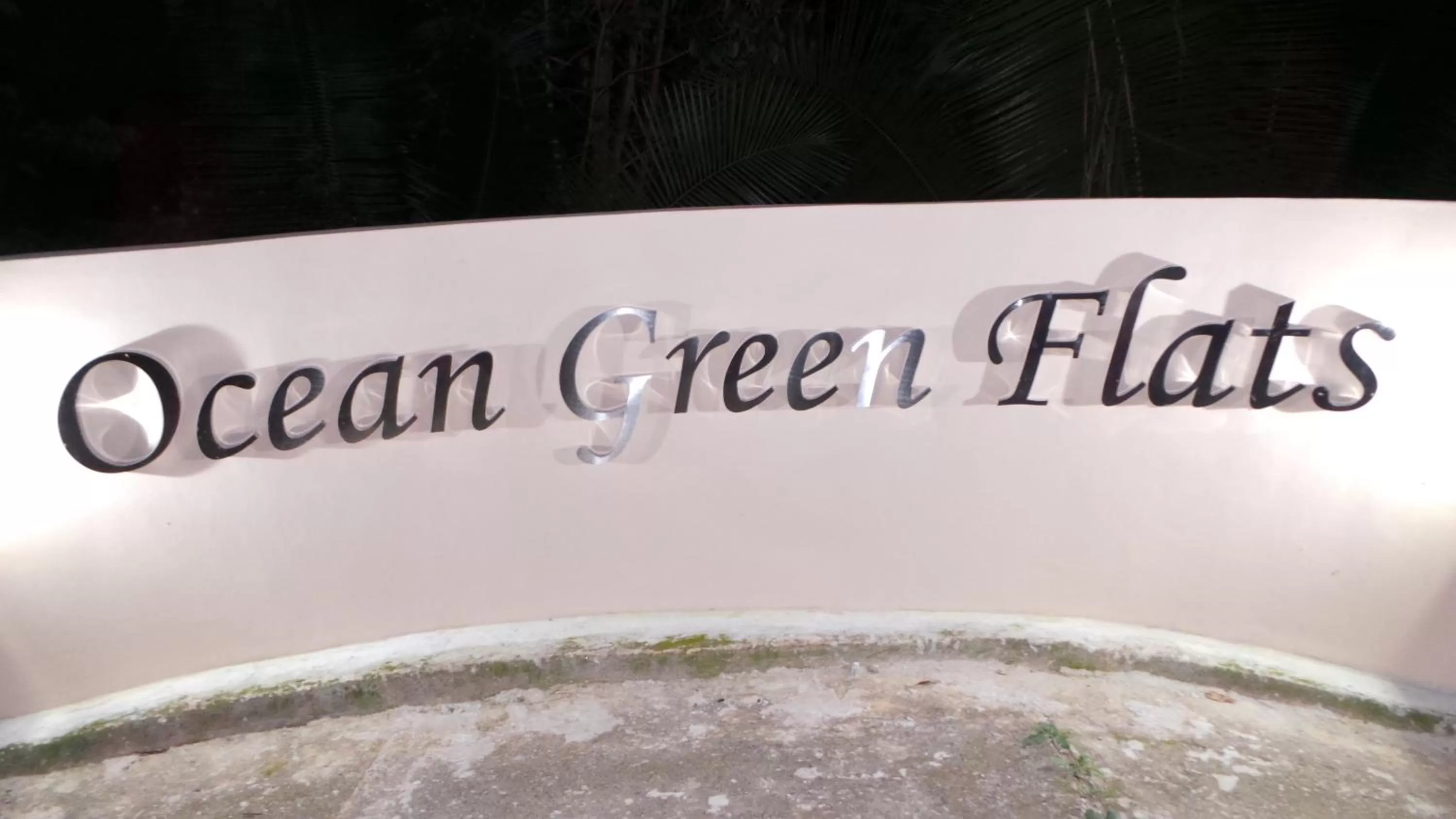Property logo or sign in Ocean Green Flats