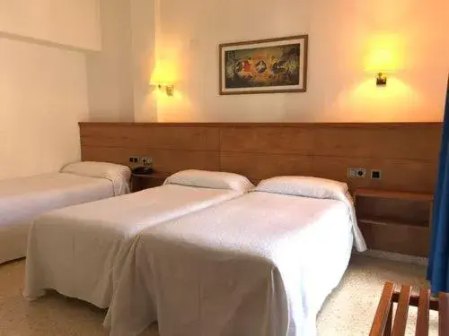 Bed in Hotel Octavia
