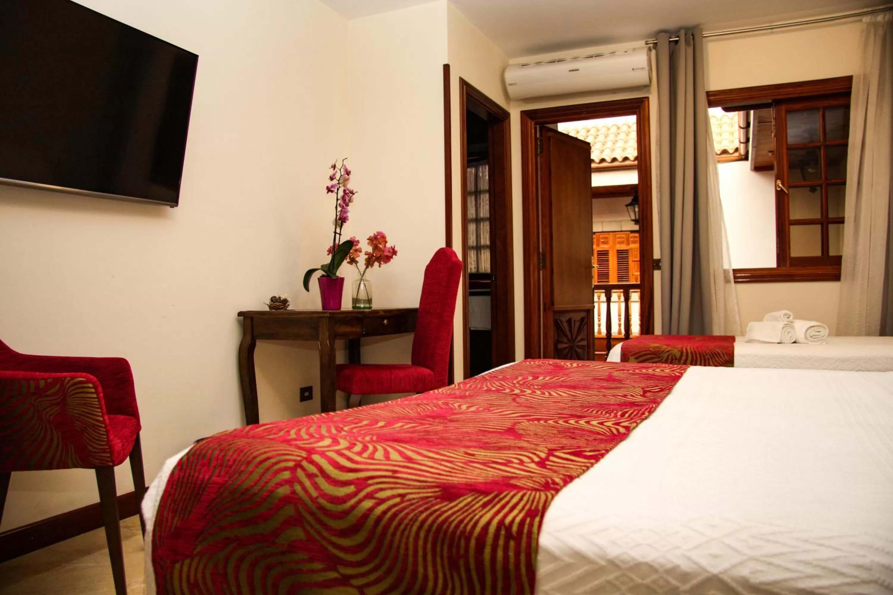 Communal lounge/ TV room, Bed in Il Sogno di Gio de la Laguna