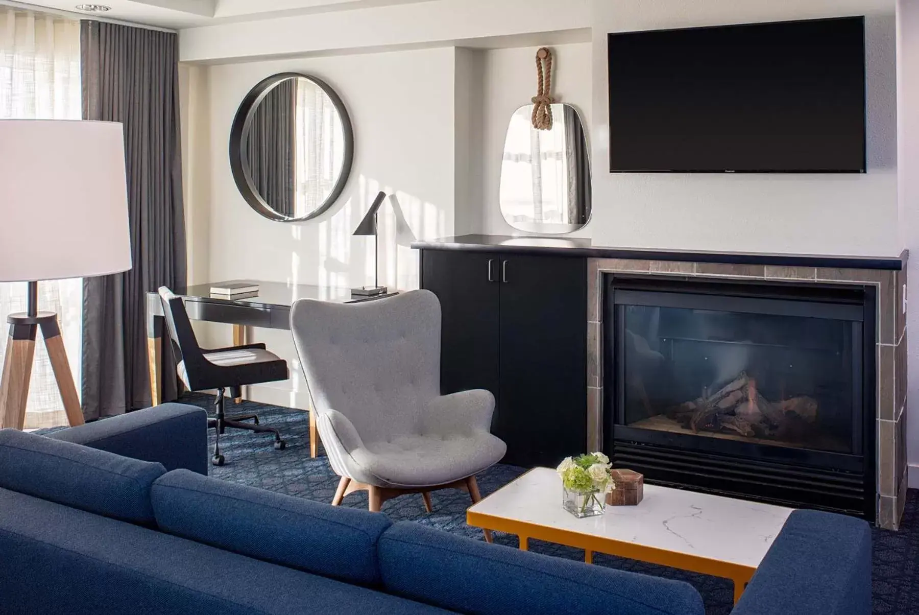 TV and multimedia, TV/Entertainment Center in River's Edge Hotel Portland, Tapestry Collection by Hilton