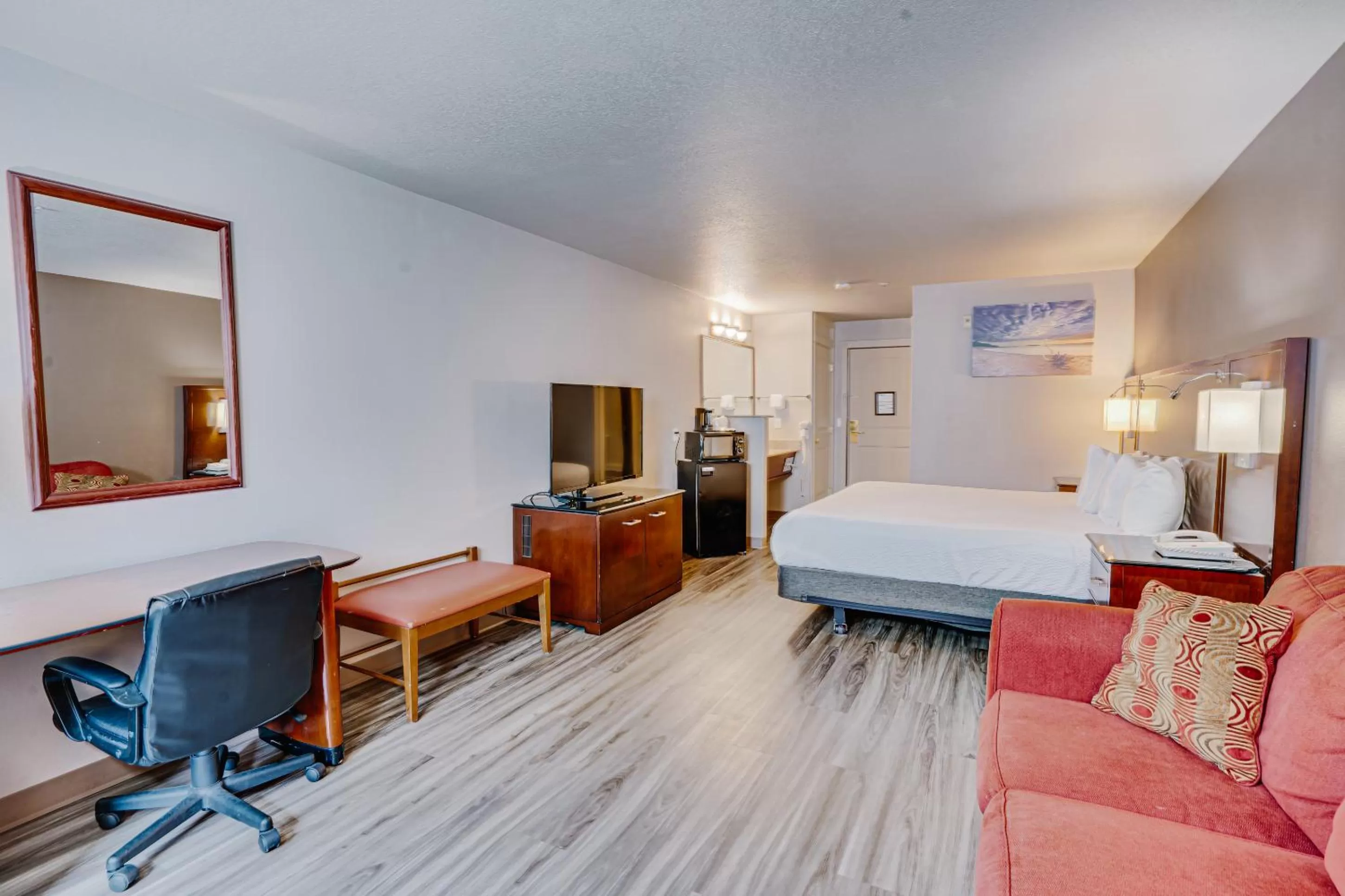 Bed in The Ashley Inn & Suites