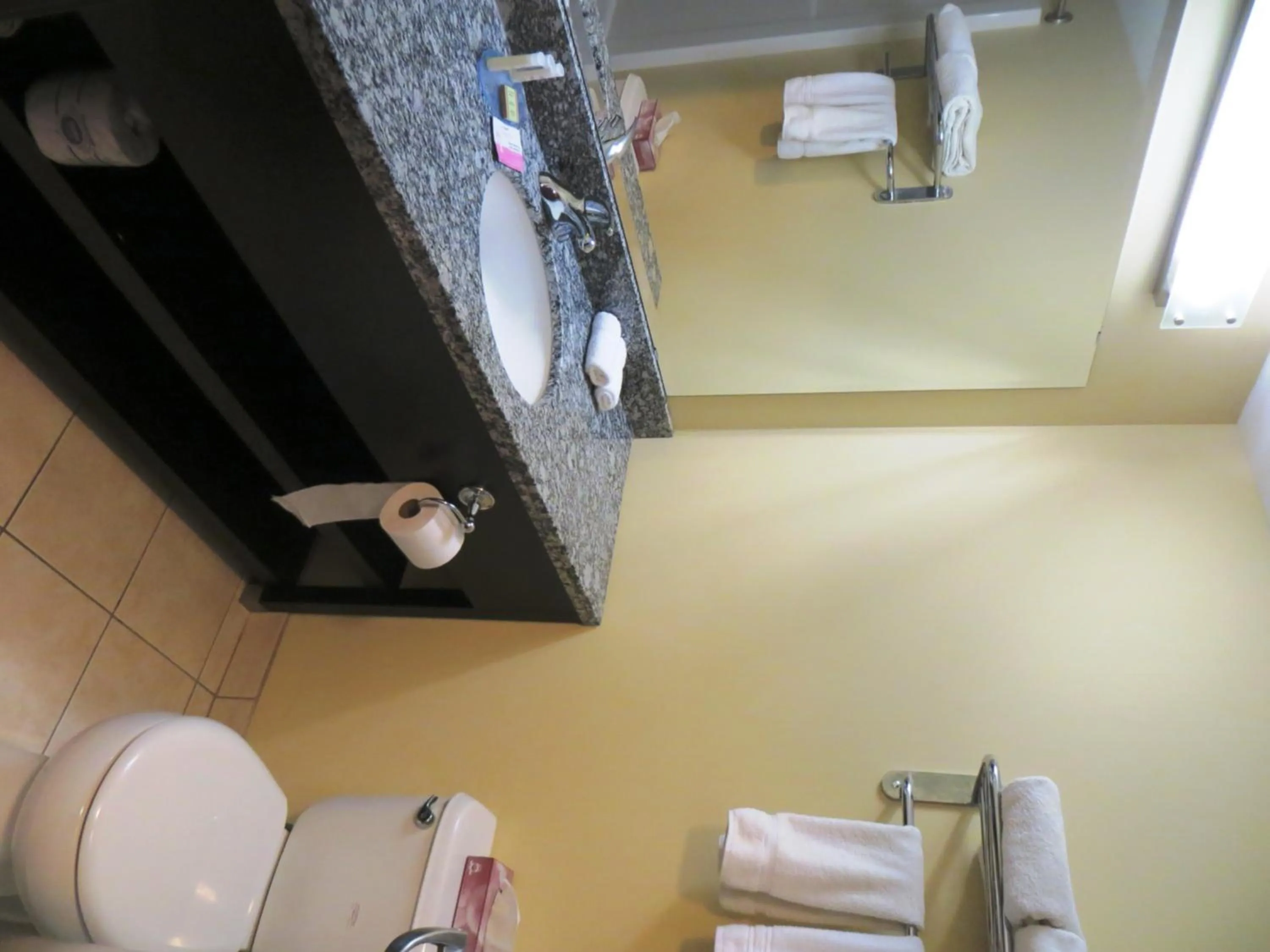 Bathroom in Super 8 by Wyndham Saskatoon Near Downtown