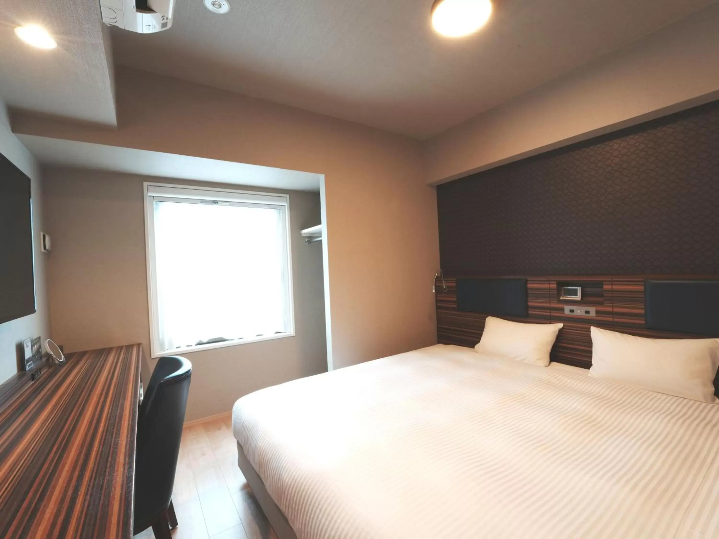 Photo of the whole room, Bed in The BREAKFAST HOTEL Fukuoka Nakasu