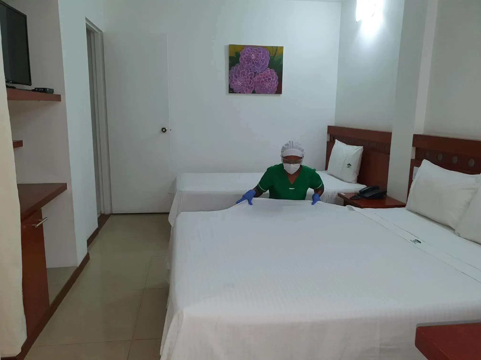 Bed in Hotel Imbanaco