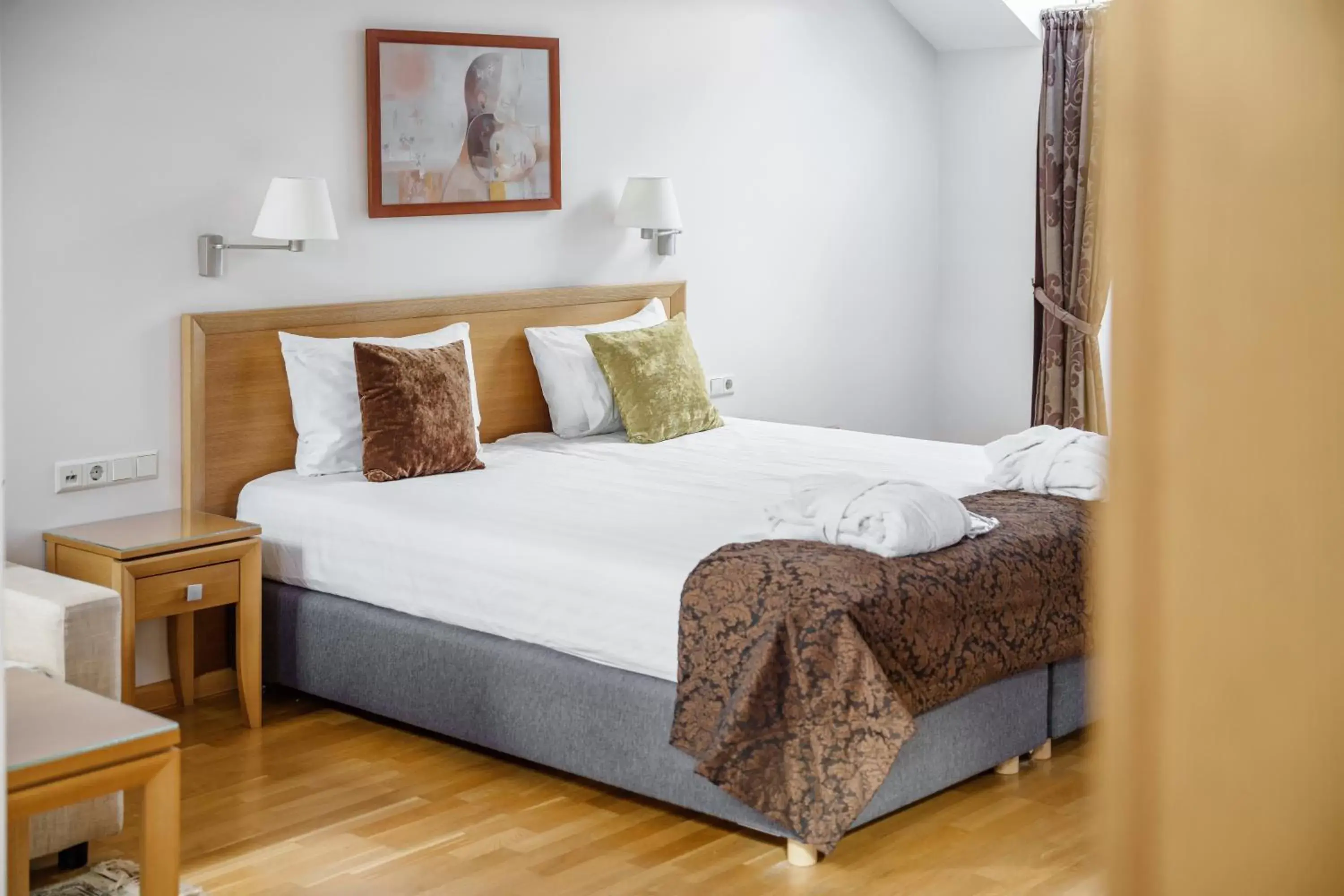 Bed in Euterpe Hotel Bed in Euterpe Hotel