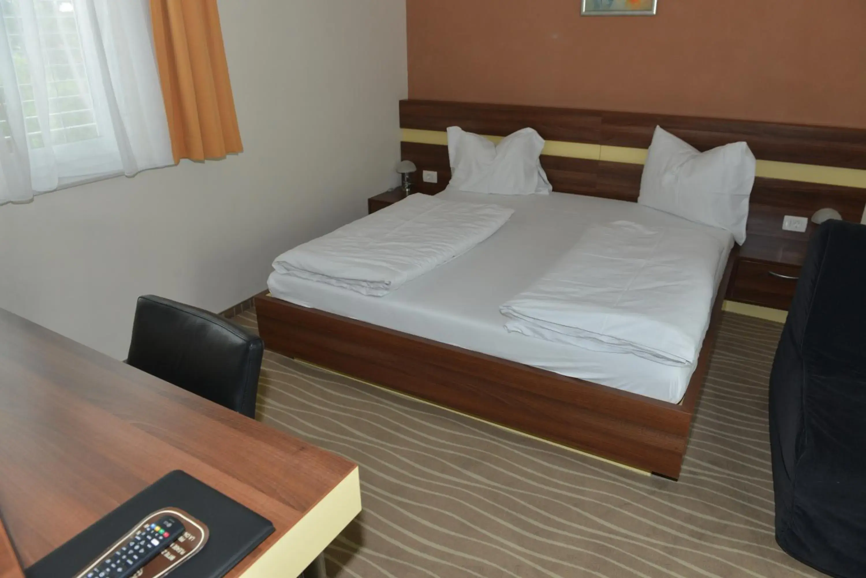 Bed in Primus Hotel & Apartments