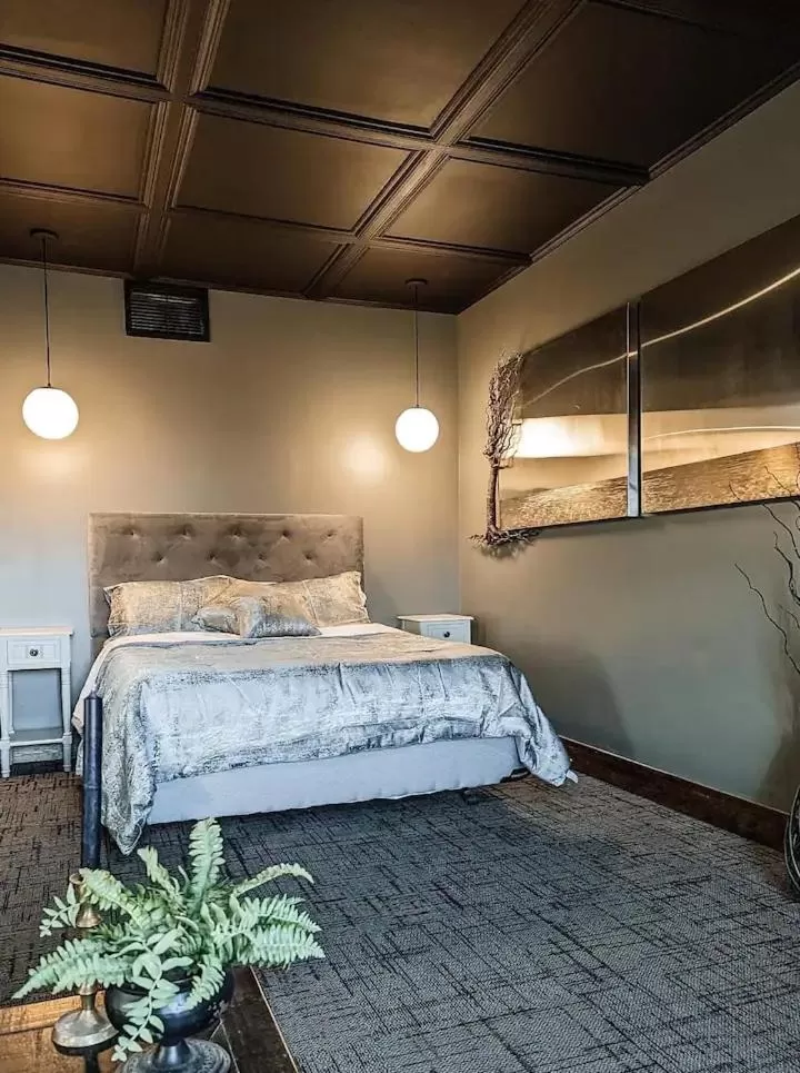 Bed in Rockwell Suites