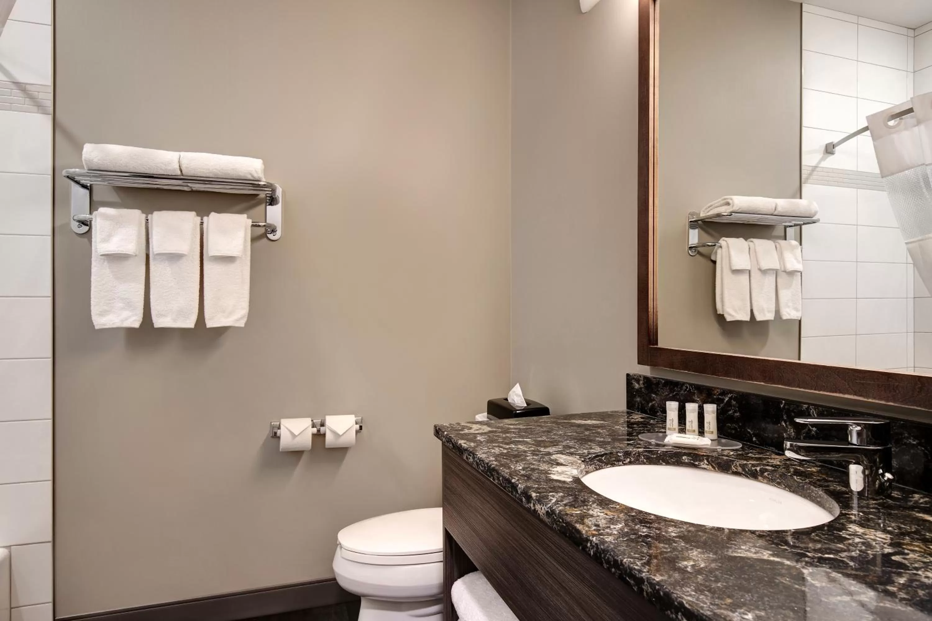 Bathroom in Days Inn & Suites by Wyndham Warman