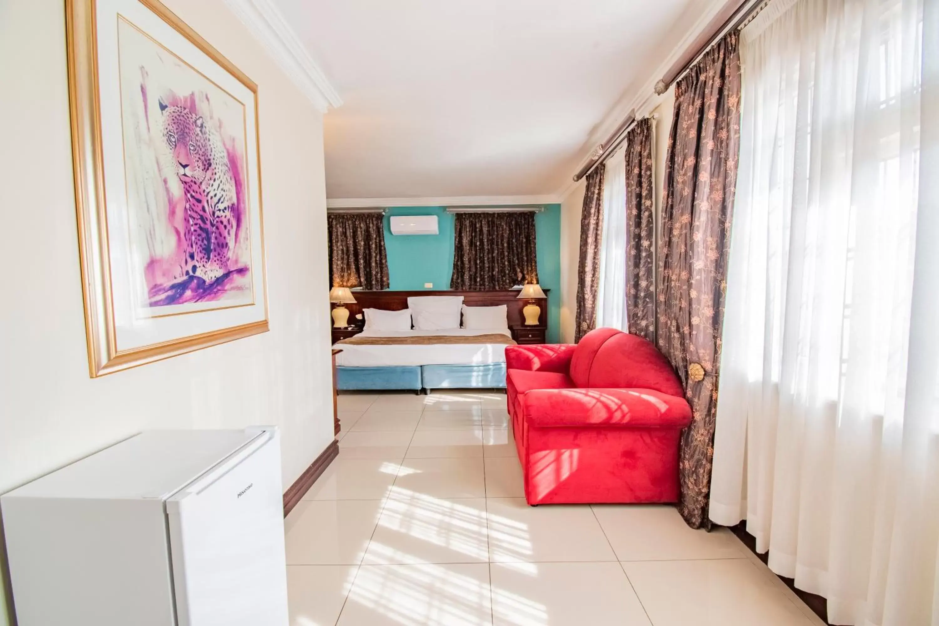 Bedroom, Seating Area in Emakhosini Boutique Hotel