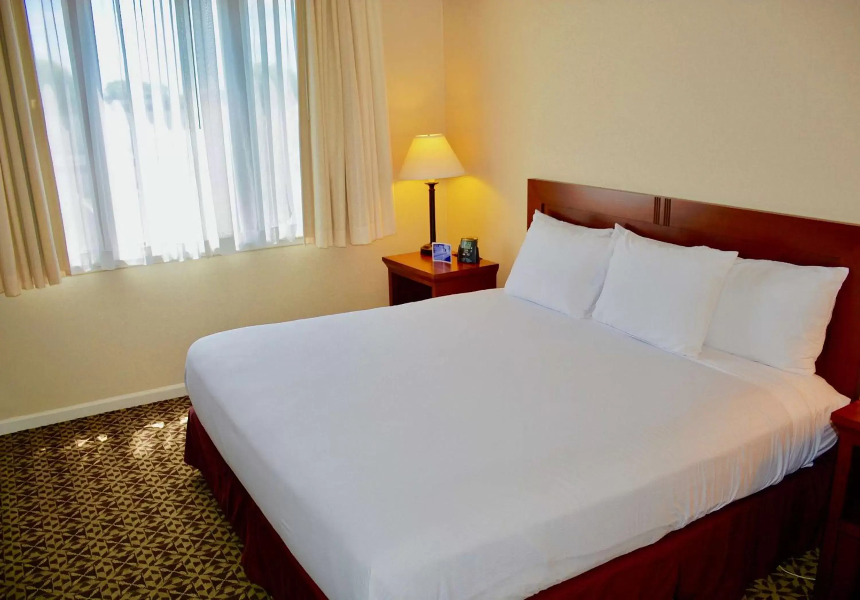 Bed in DoubleTree Suites by Hilton Mount Laurel