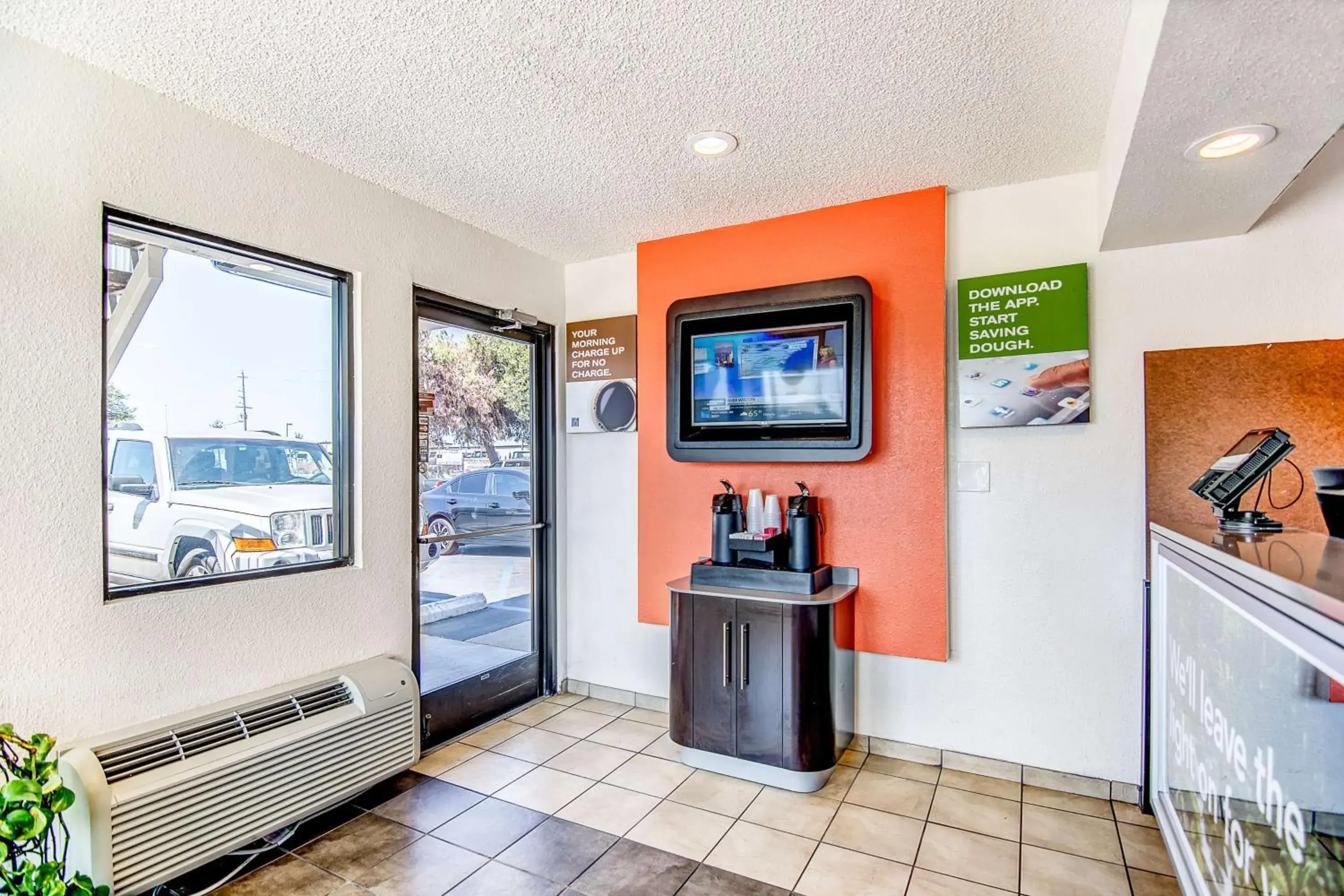 Communal lounge/ TV room in Motel 6-Stockton, CA - Charter Way West