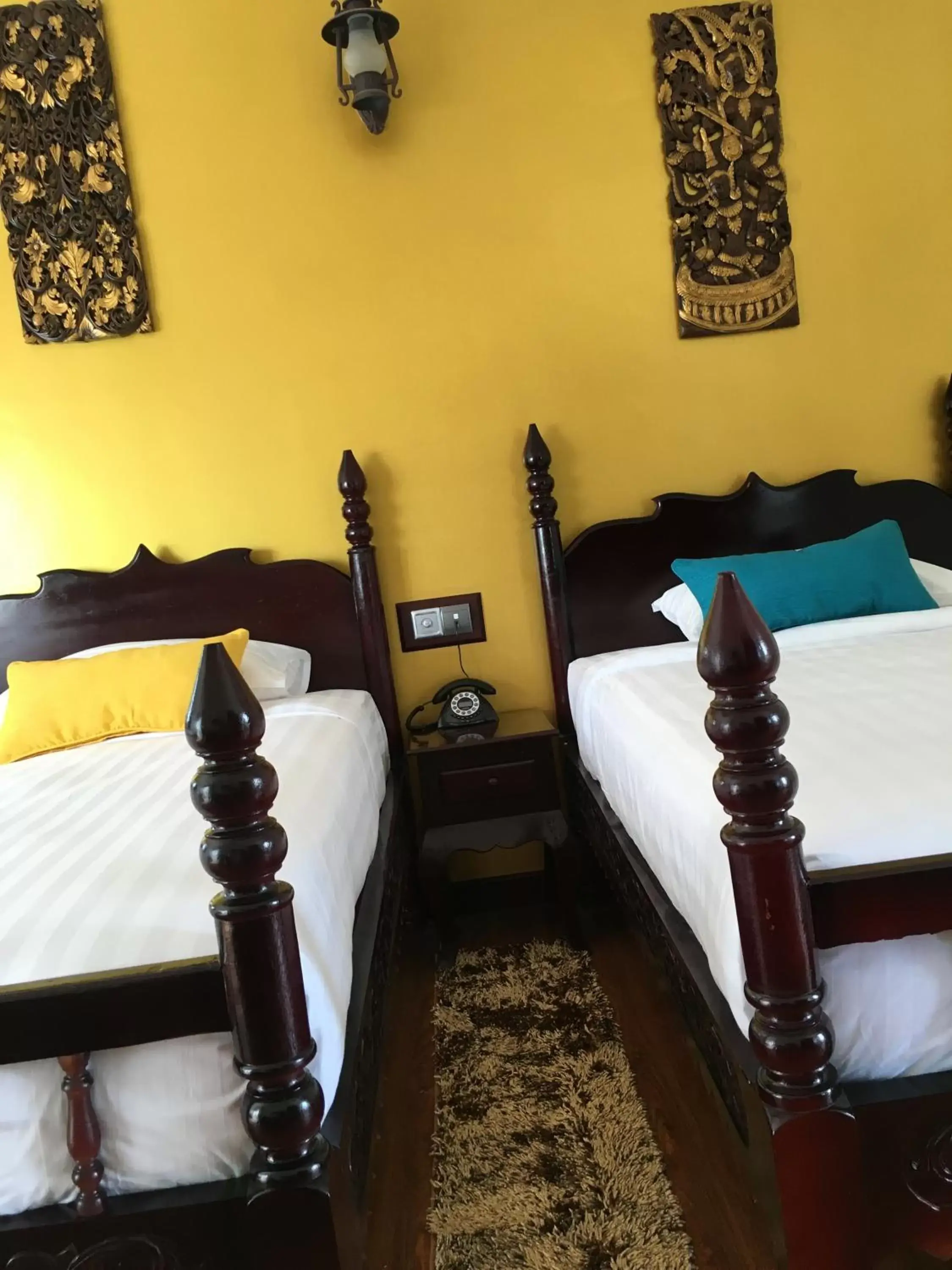 Bed, Fitness Center/Facilities in Beyond Yangon Inn