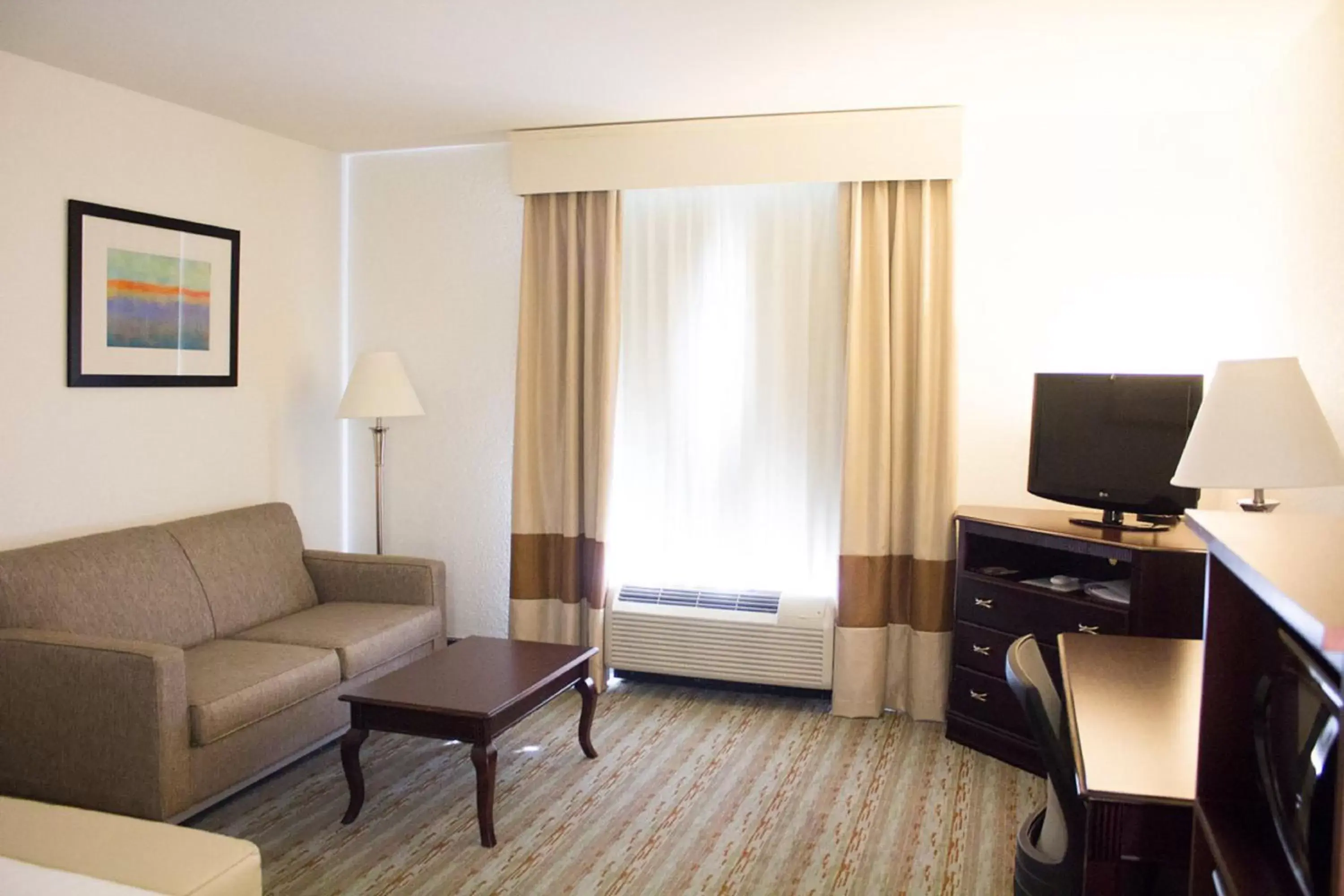 Photo of the whole room, TV/Entertainment Center in Holiday Inn Express West Jefferson, an IHG Hotel