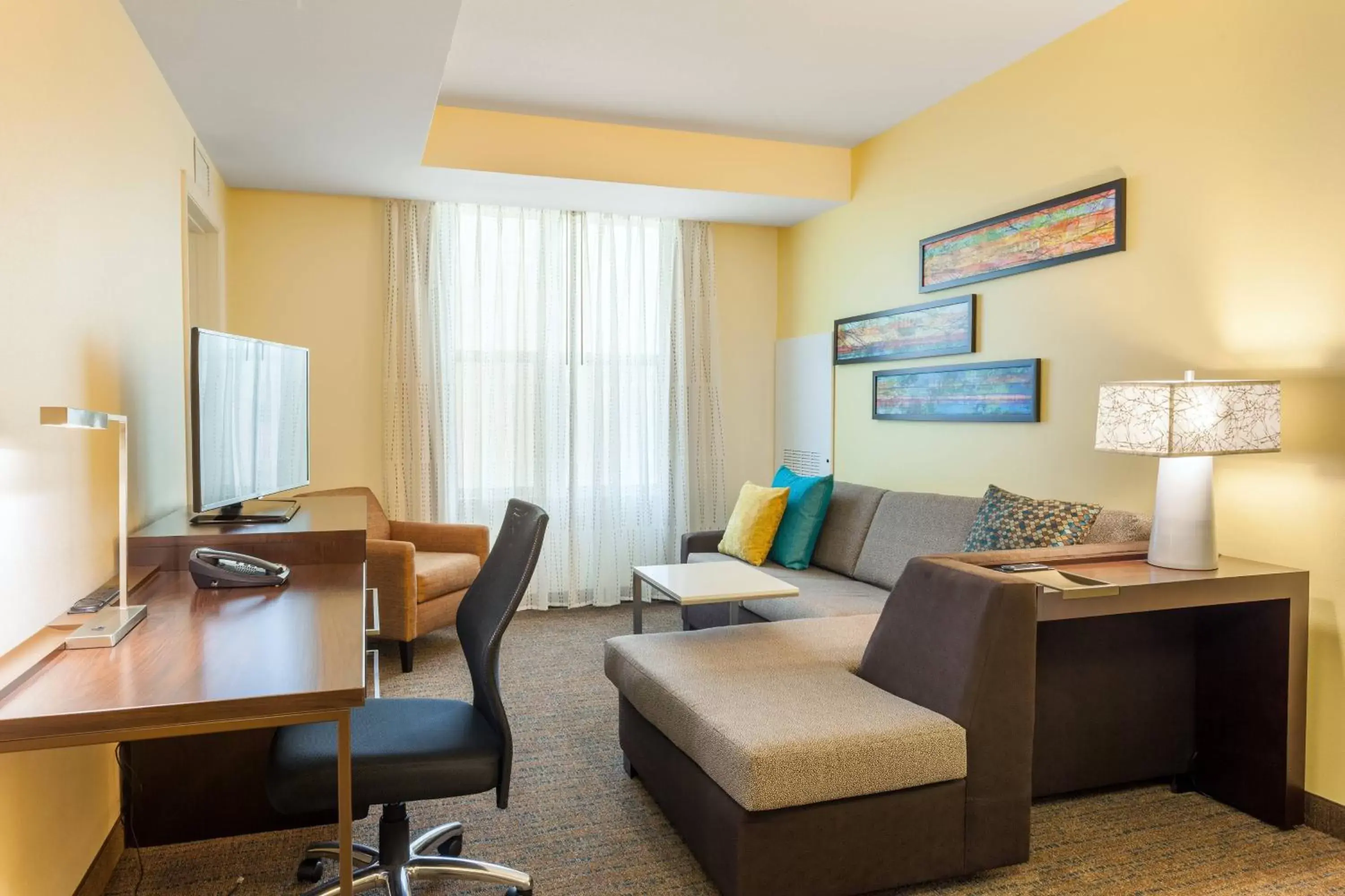Living room, Seating Area in Residence Inn by Marriott Orlando Downtown