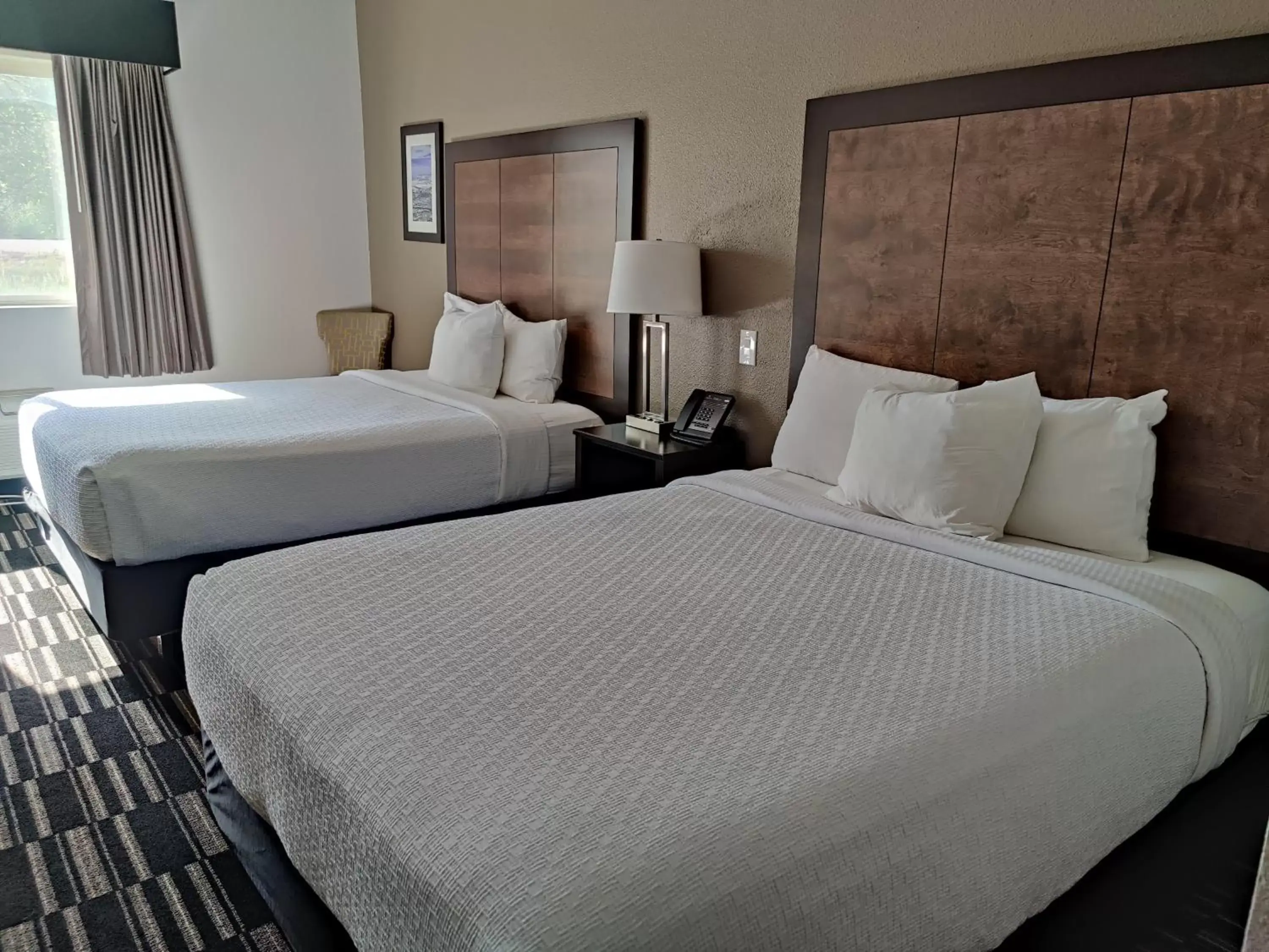 Bed in La Quinta Inn by Wyndham Steamboat Springs
