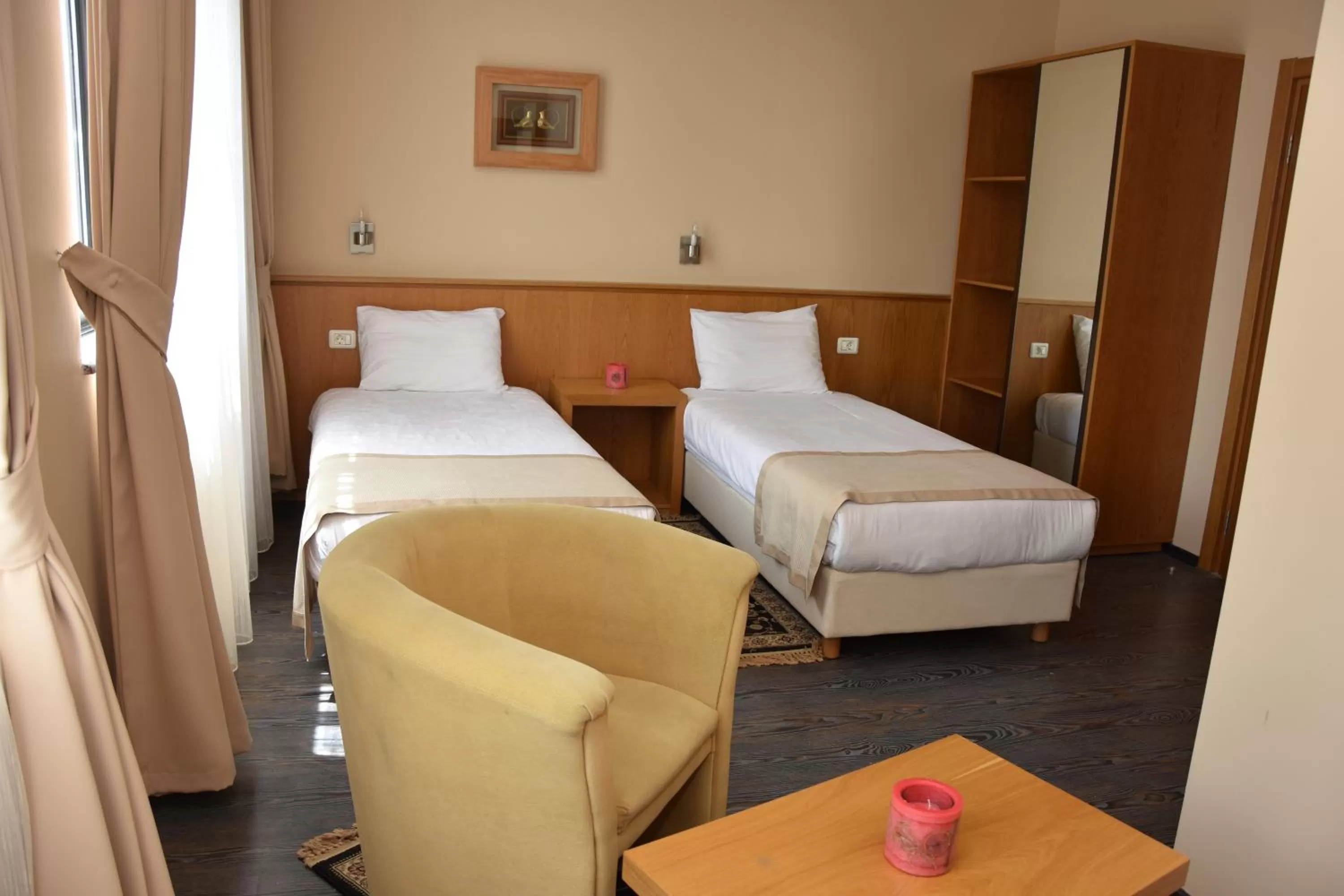 Seating area, Bed in Hotel Lirak