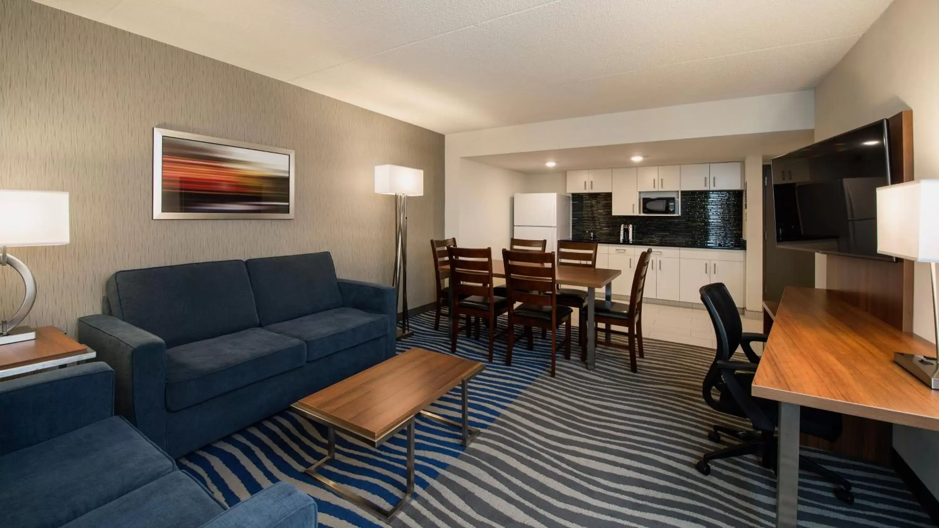 Photo of the whole room, Seating Area in Holiday Inn Winnipeg - Airport West, an IHG Hotel
