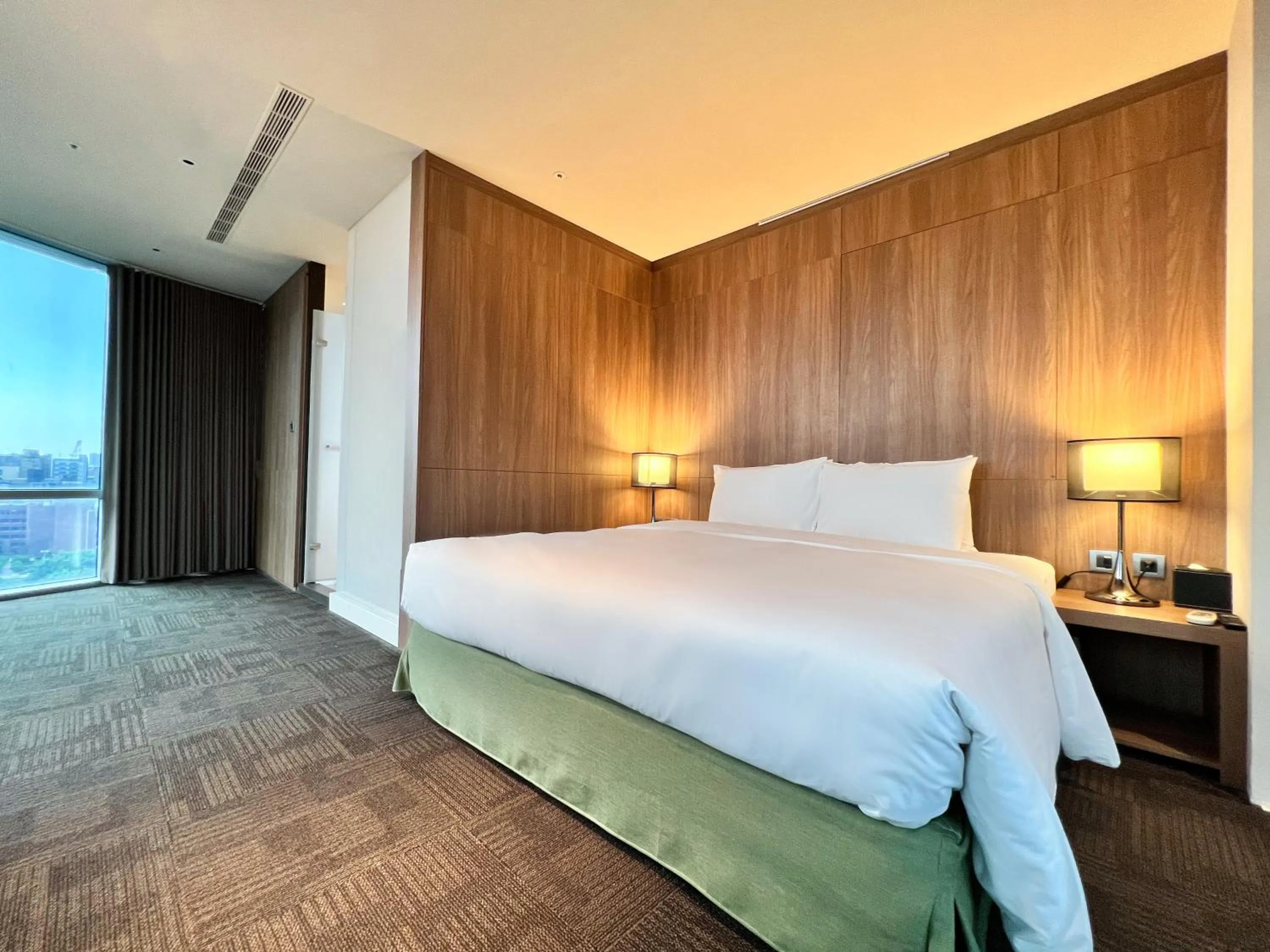 Bed in Wallsun Hotel