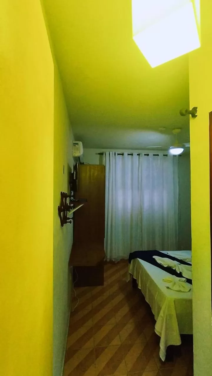 Bed in Pousada Do Suiá